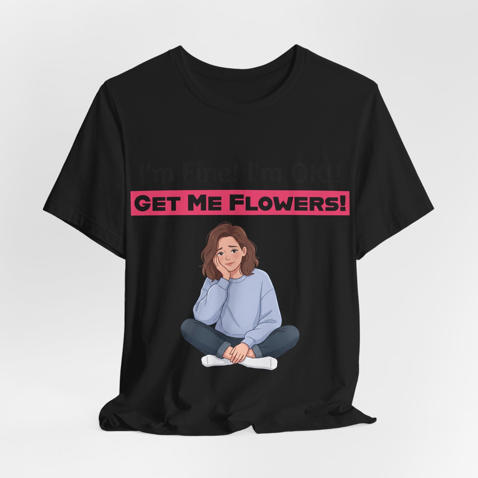 Black t-shirt with a cartoon woman seated and text reading "I'm Fine! I'm OK!! GET ME FLOWERS!"