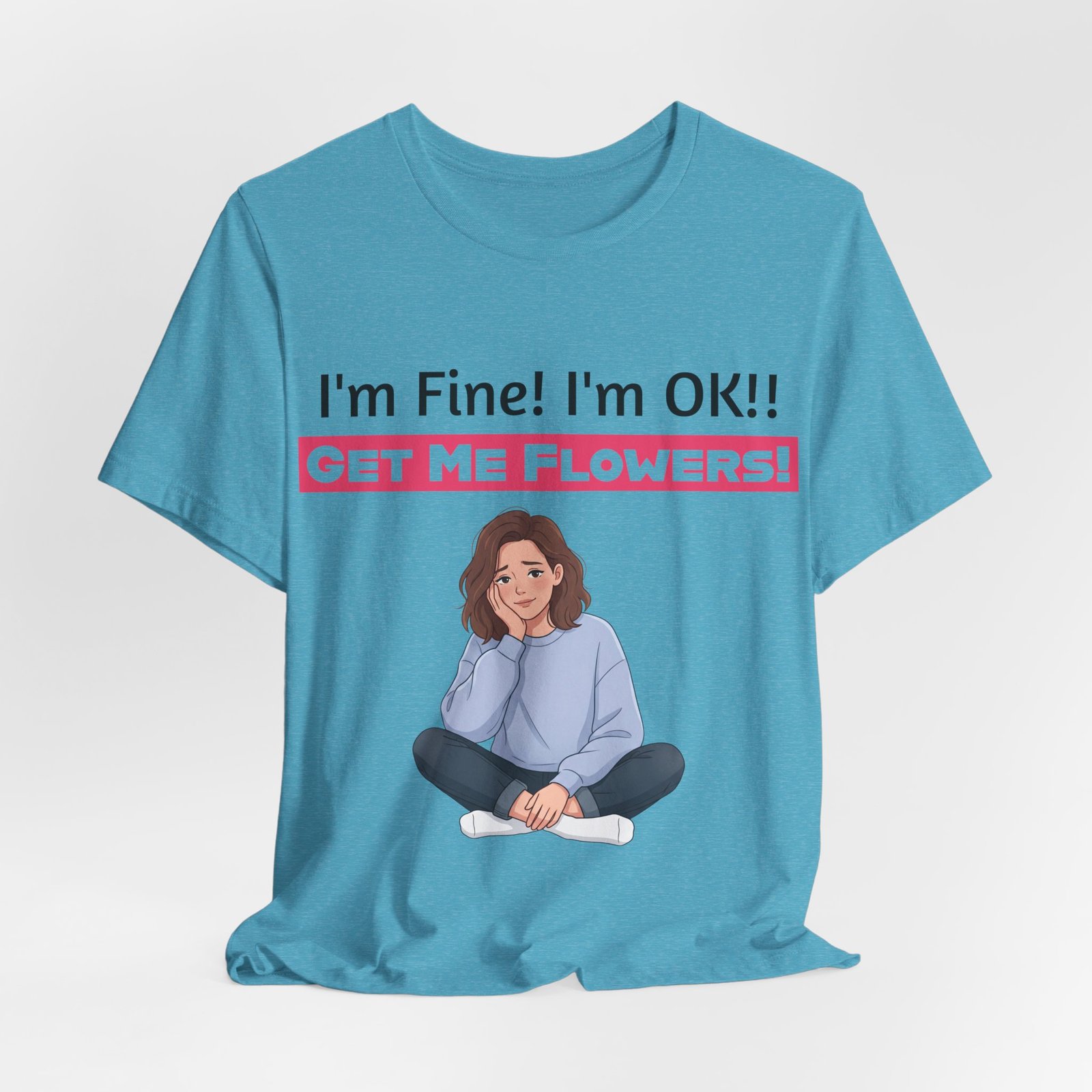Blue t-shirt featuring an illustration of a weary person and the text "I'm Fine! I'm OK!! GET ME FLOWERS!"