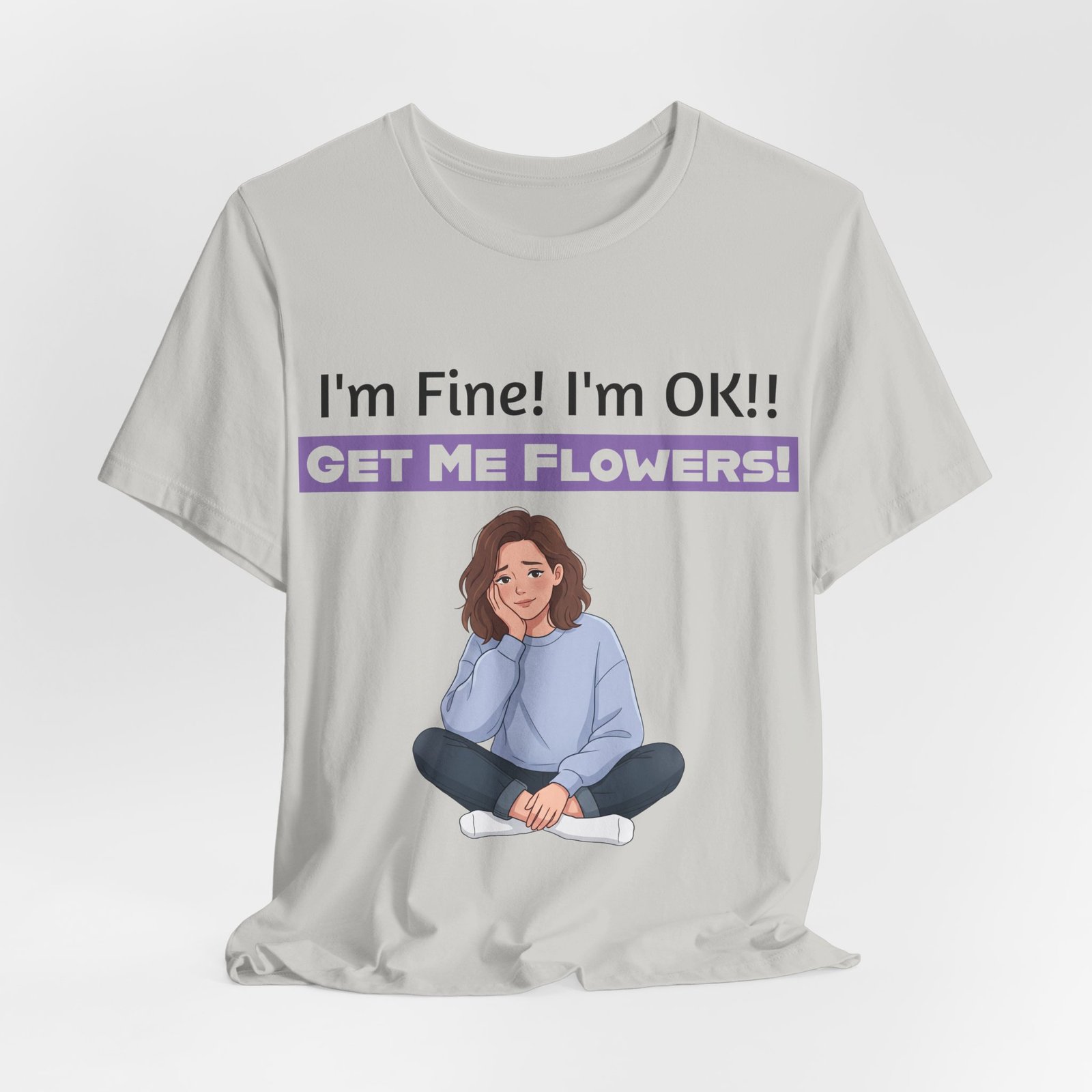 Grey t-shirt featuring an illustration of a girl and the funny text I'm Fine! I'm OK!! GET ME FLOWERS!