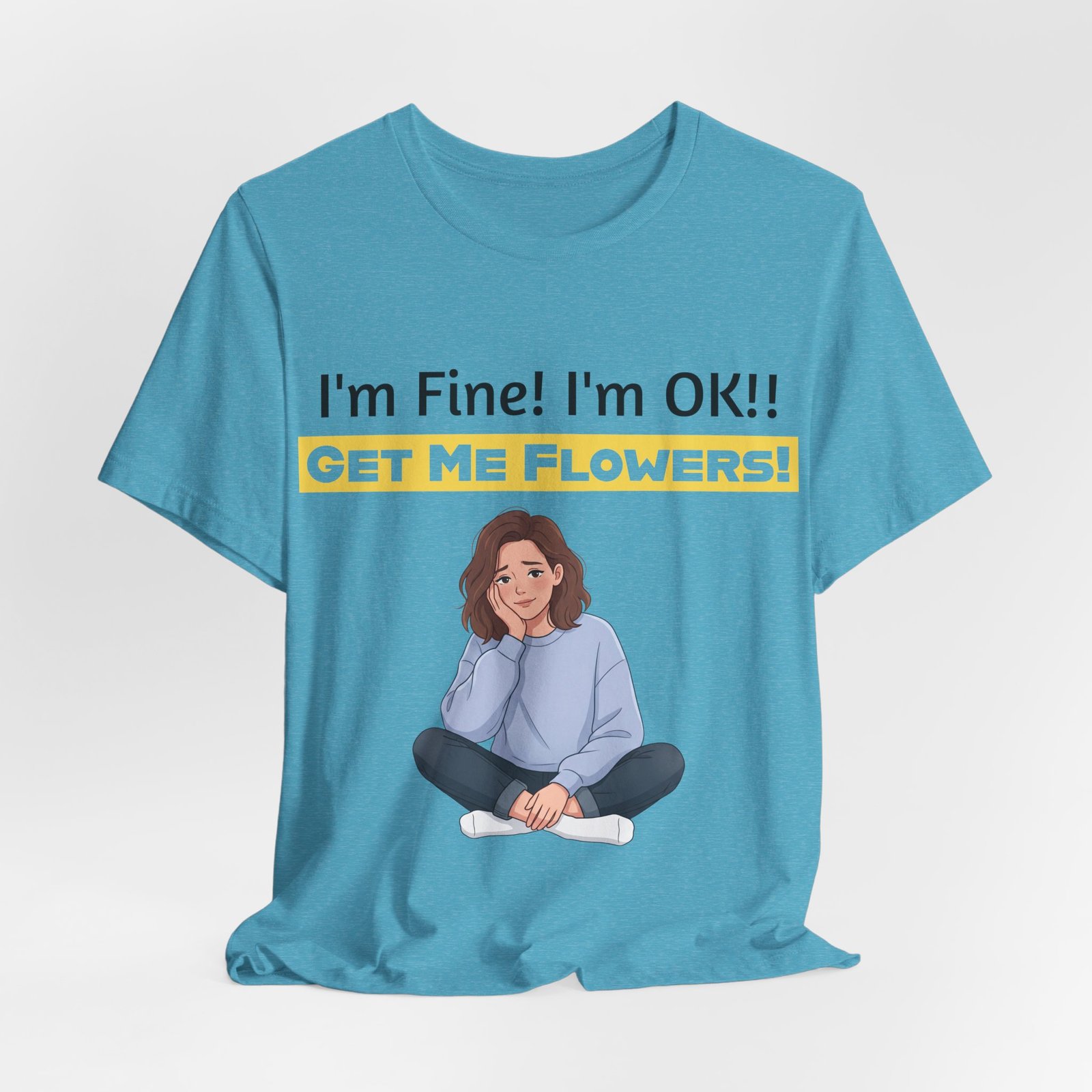 Light blue t-shirt featuring a funny illustration of a girl and the text I'm Fine! I'm OK!! Get Me Flowers!