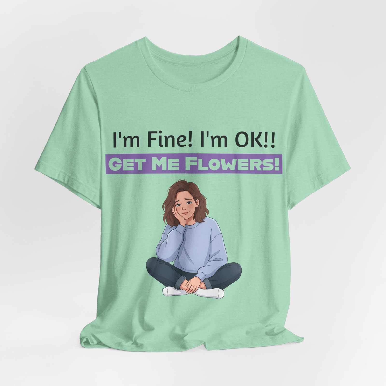 Mint green t-shirt featuring a girl illustration and text: I'm Fine! I'm OK!! GET ME FLOWERS!
