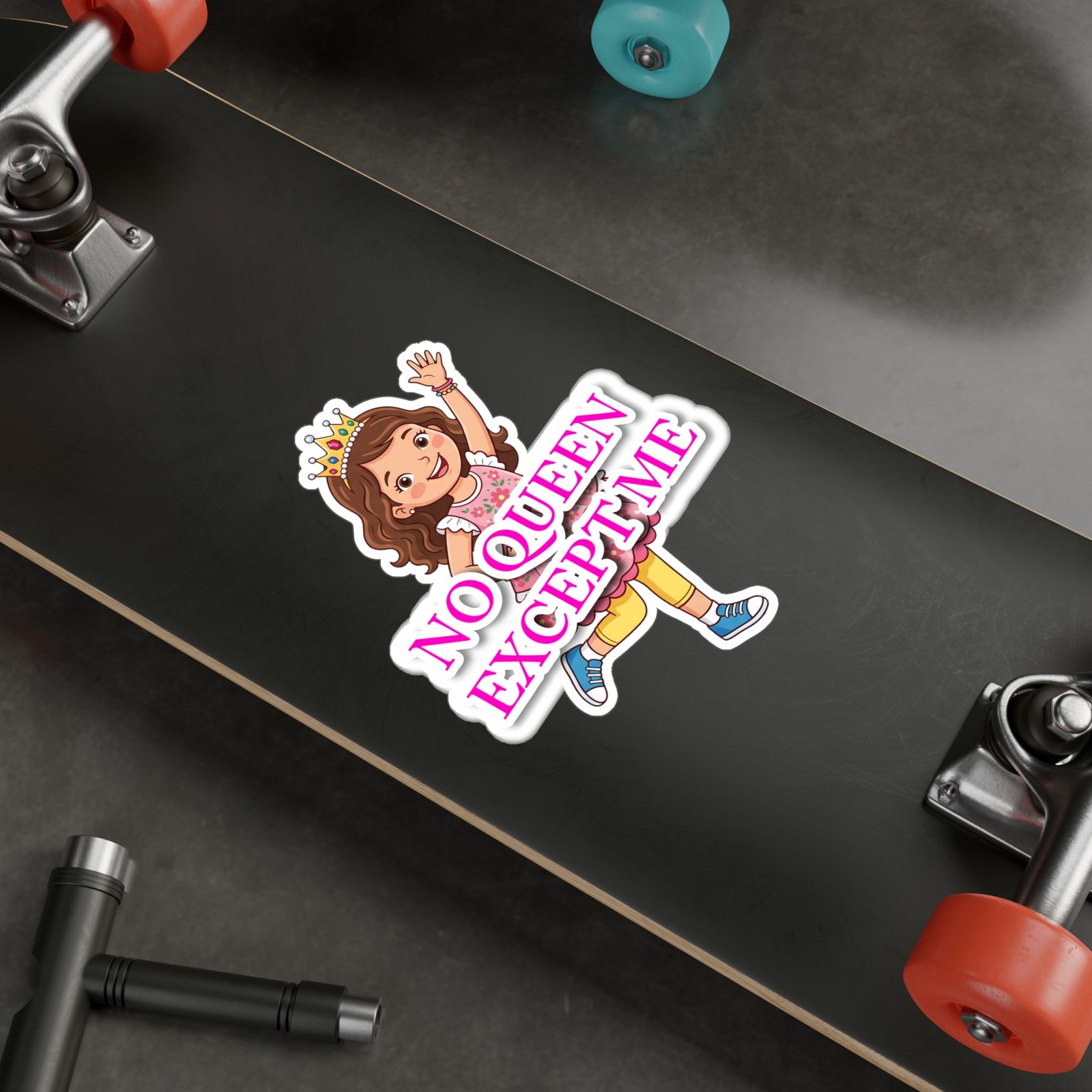 No Queen Except Me girl crown vinyl sticker with pink lettering displayed on a black skateboard deck.