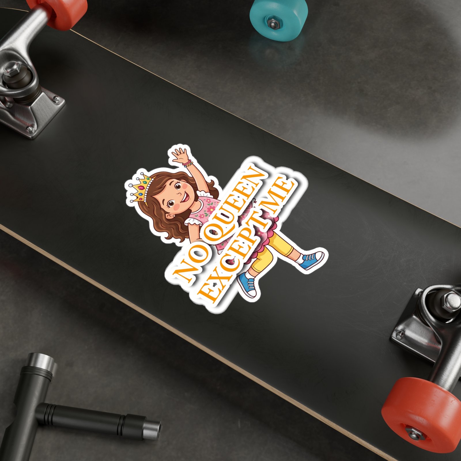 No Queen Except Me sticker with a cheerful little queen character and bold orange lettering on a black skateboard.