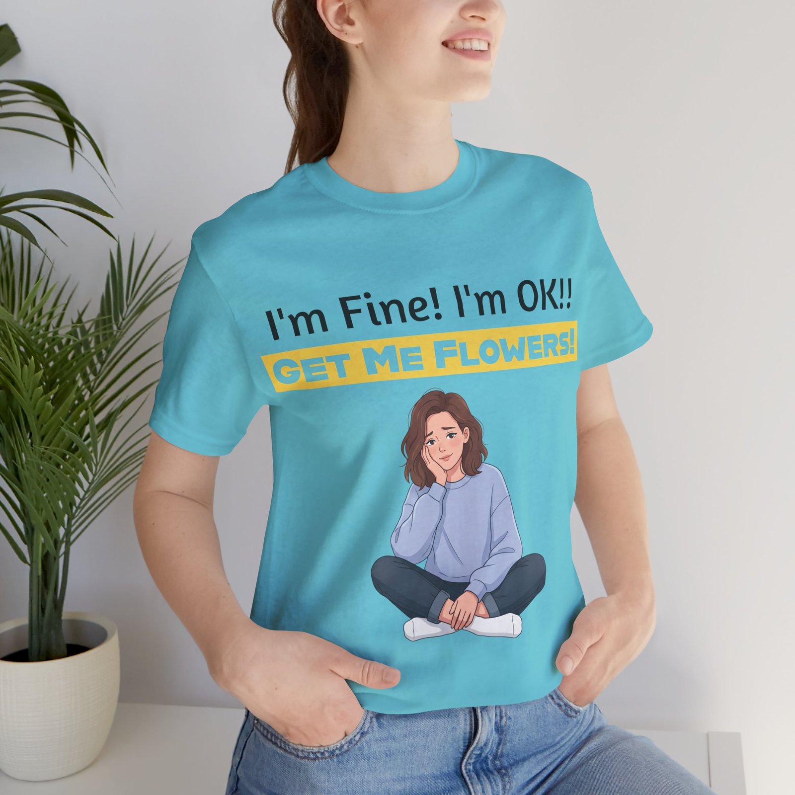 Person wearing light blue I'm Fine! I'm OK!! Get Me Flowers! Funny T-Shirt with cartoon illustration.