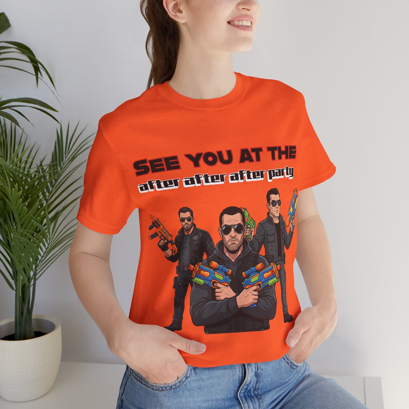 Person wearing orange See You At The After After After Party T-Shirt featuring three characters with water guns.
