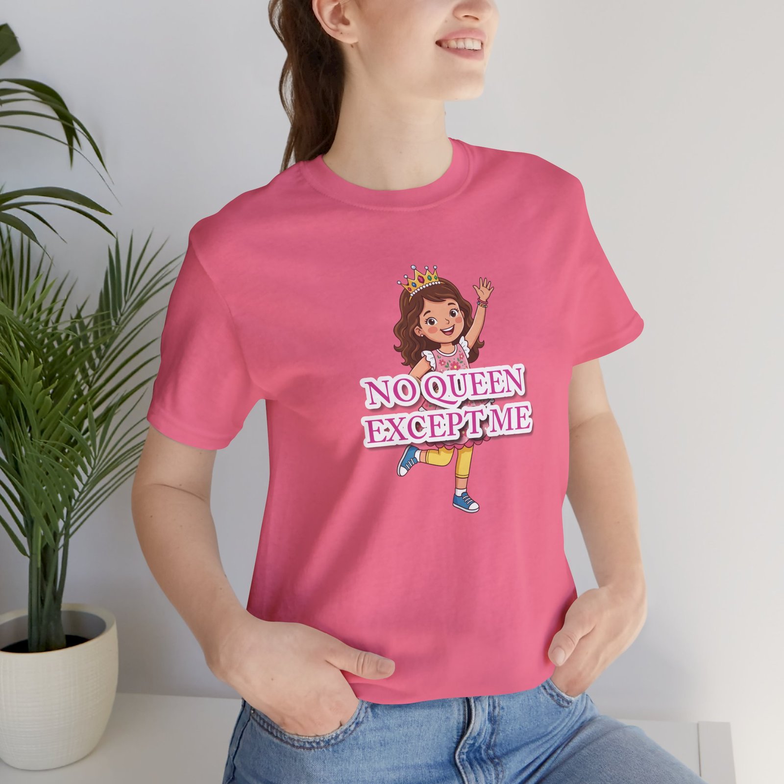 Pink 'No Queen Except Me' girls' t-shirt featuring a whimsical illustration of a confident little queen wearing a crown.