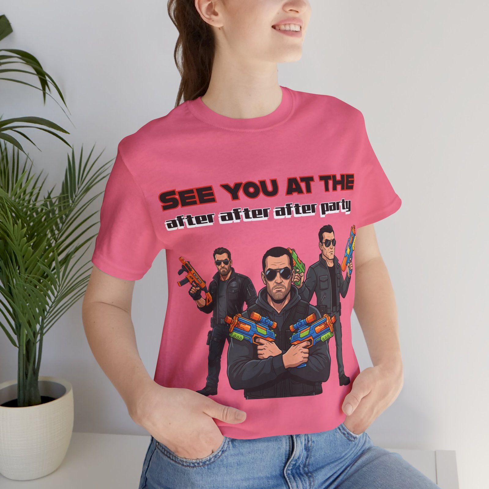 Pink t-shirt featuring three sunglasses-clad characters with colorful toy blasters and the text See You At The After Party