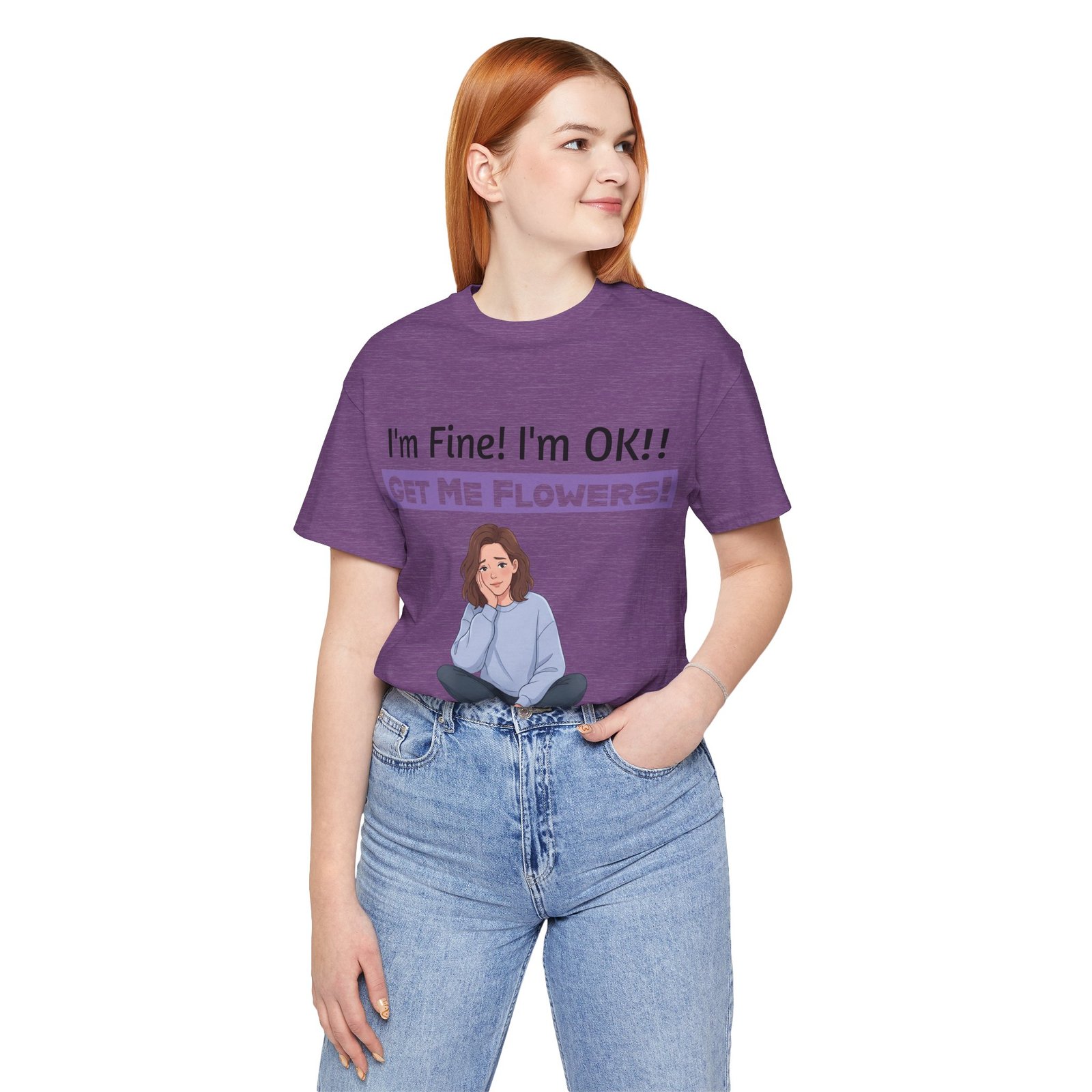 Purple T-shirt featuring a cartoon girl and the text "I'm Fine! I'm OK!! GET ME FLOWERS!" worn by a woman.
