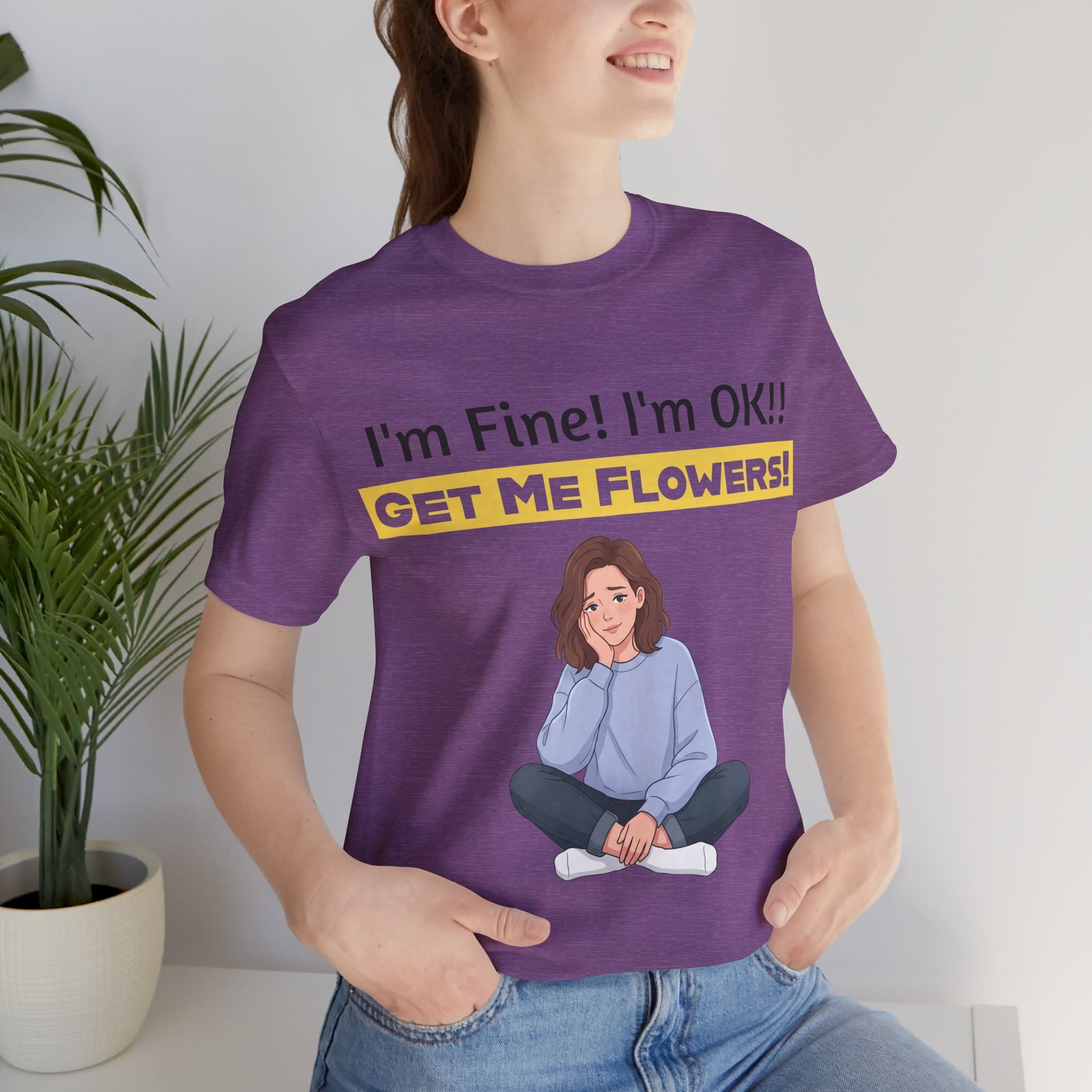 Purple T-shirt featuring a funny graphic of a girl and the text I'm Fine! I'm OK!! GET ME FLOWERS!