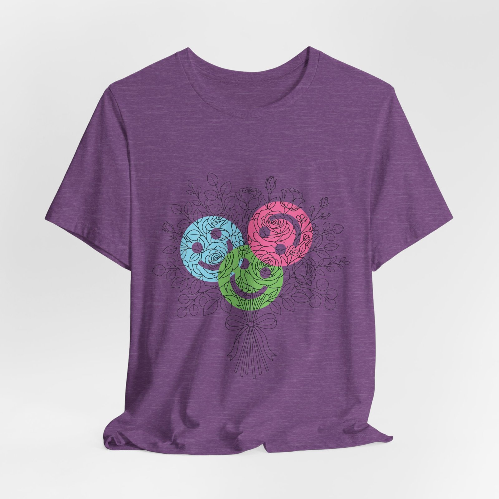 Purple t-shirt featuring a hand-drawn bouquet with teal, magenta, and lime spiral yarn flower doodles.