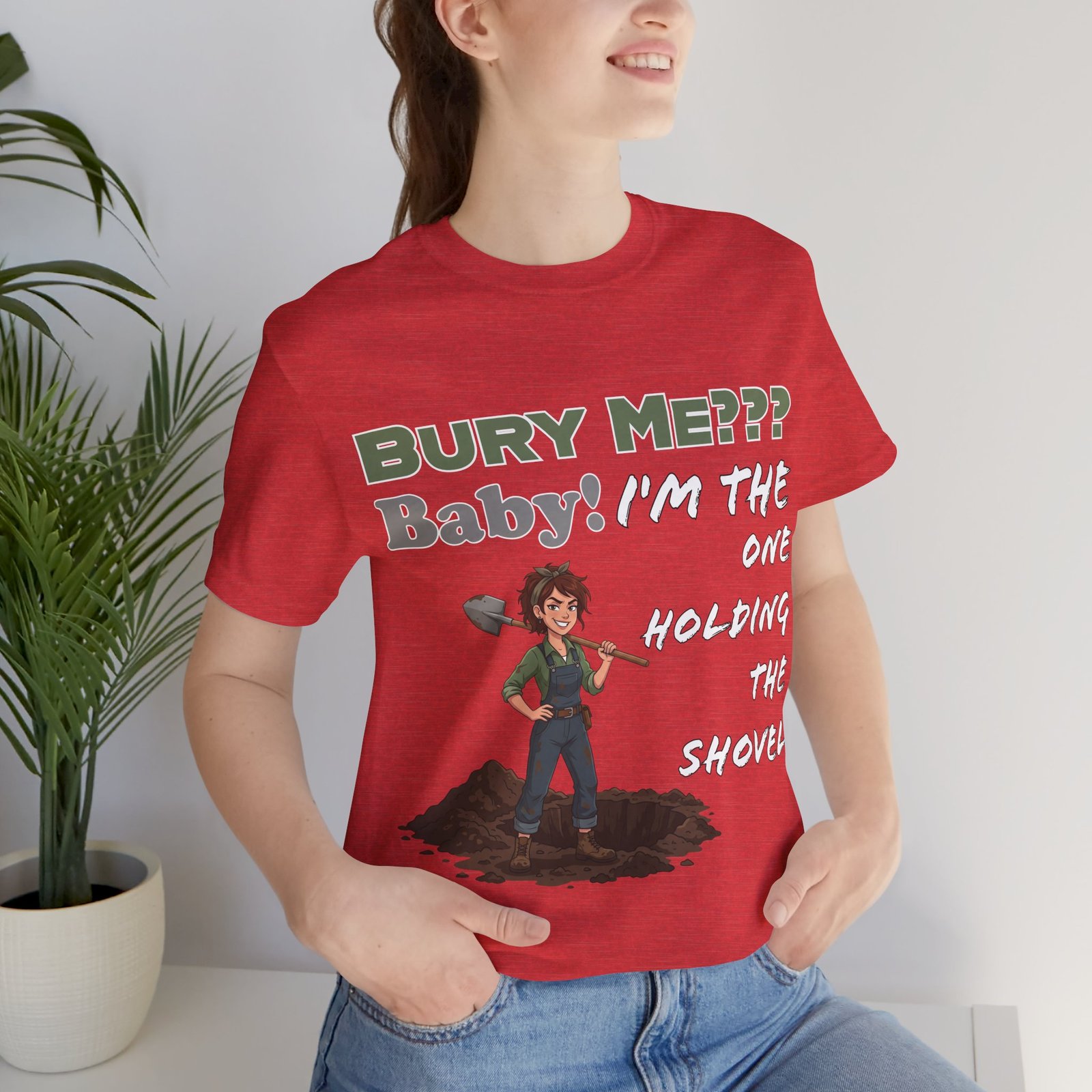 Red t-shirt featuring an illustrated character holding a shovel with the dark humor text Bury Me??? Baby! I'm the One Holding the Shovel