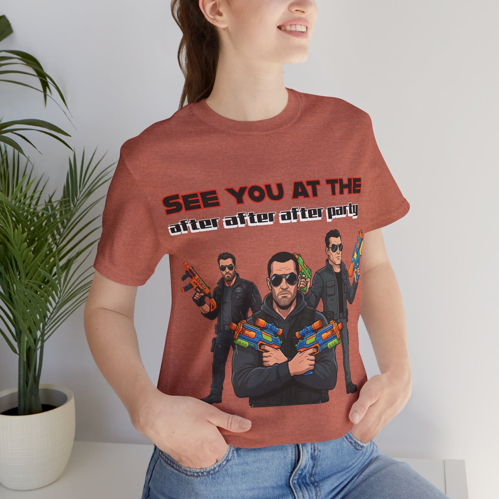 Rust-colored t-shirt featuring three cool characters in sunglasses holding colorful water guns and the text "SEE YOU AT THE after after after party".