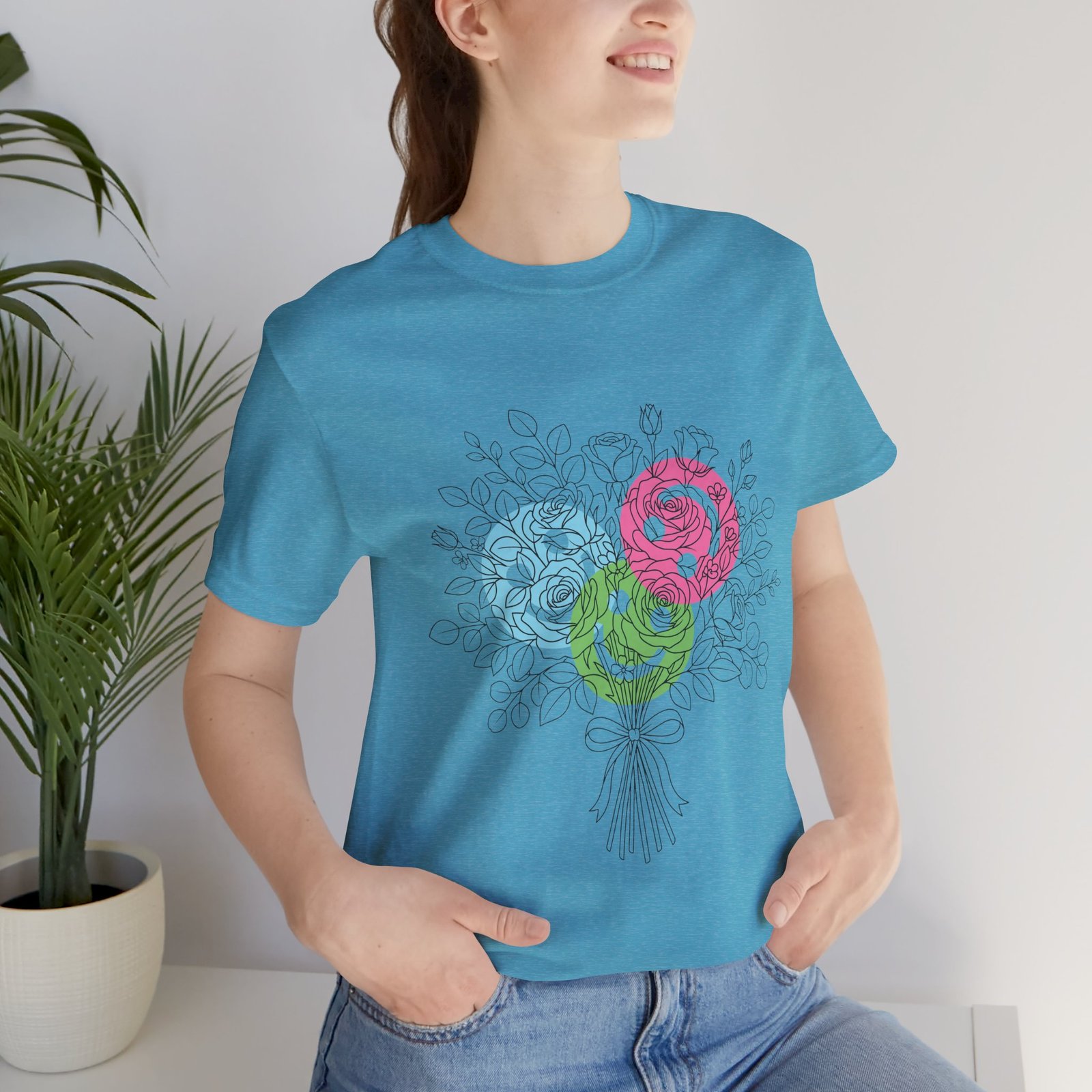 Teal t-shirt featuring a hand-drawn bouquet of teal, magenta, and lime colorful spiral flower blooms.