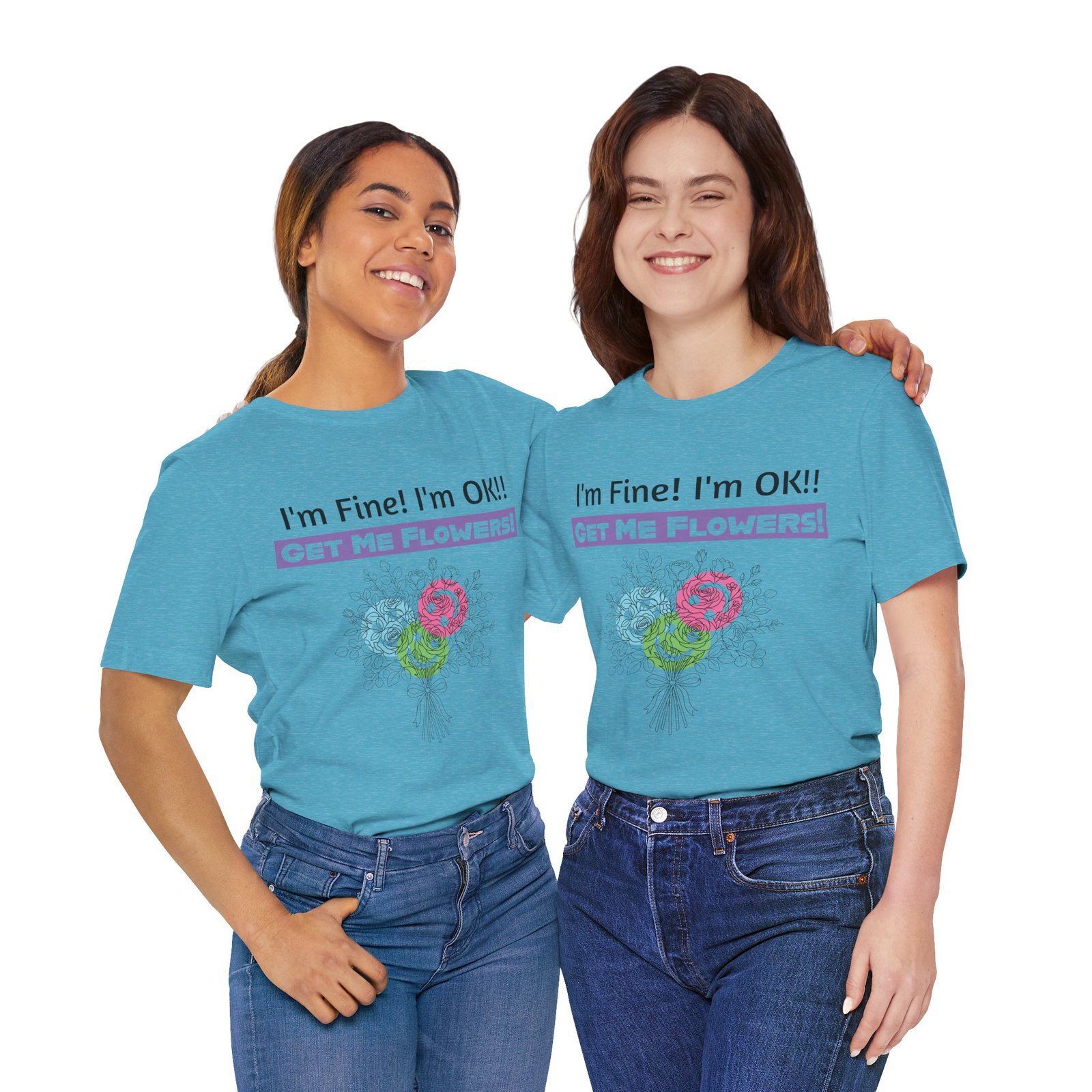 Two women smiling and wearing blue I'm Fine! I'm OK!! Get Me Flowers! graphic t-shirts with a colorful floral print.
