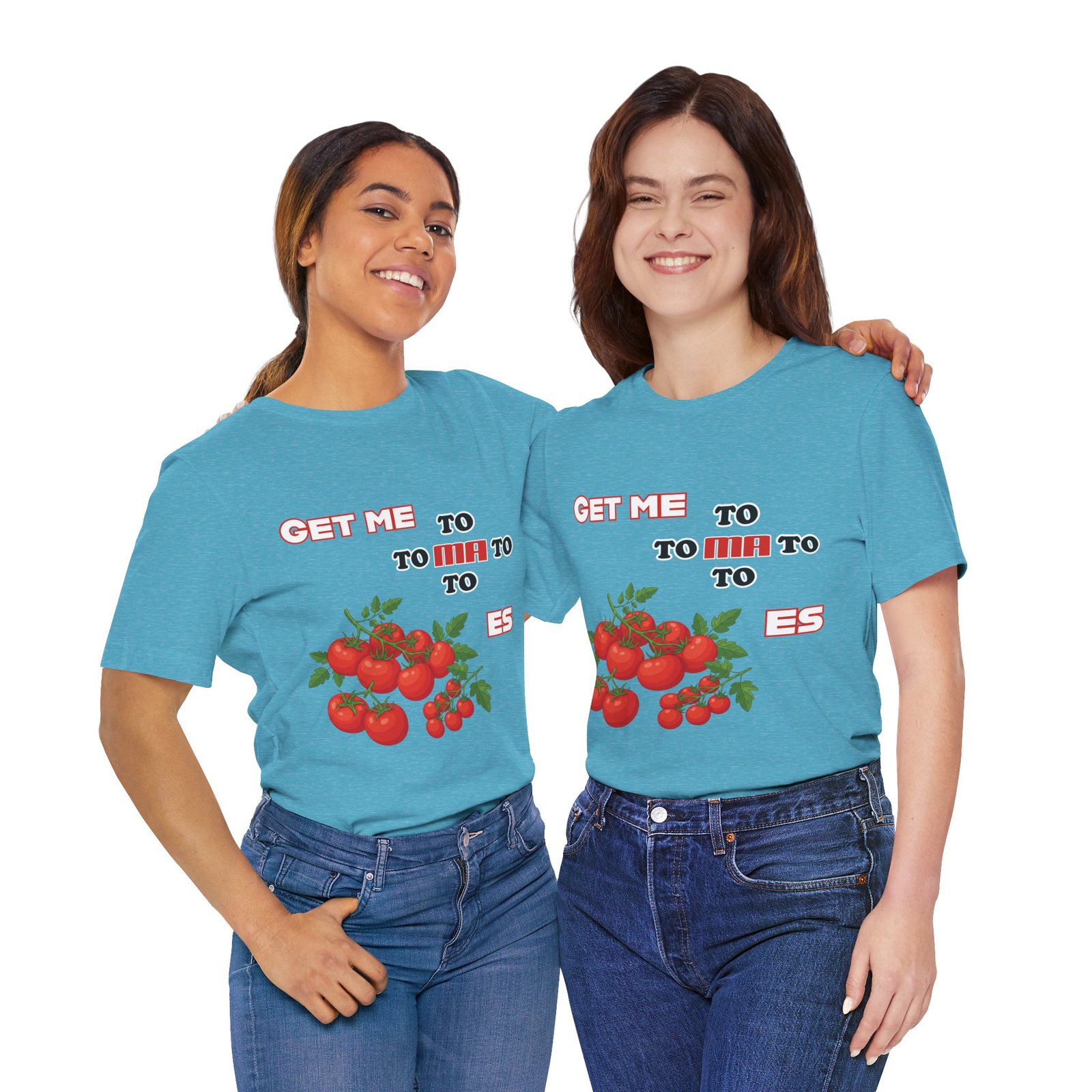 Two women smiling and wearing light blue 'Get Me To Ma To Toes' vintage tomato graphic t-shirts.