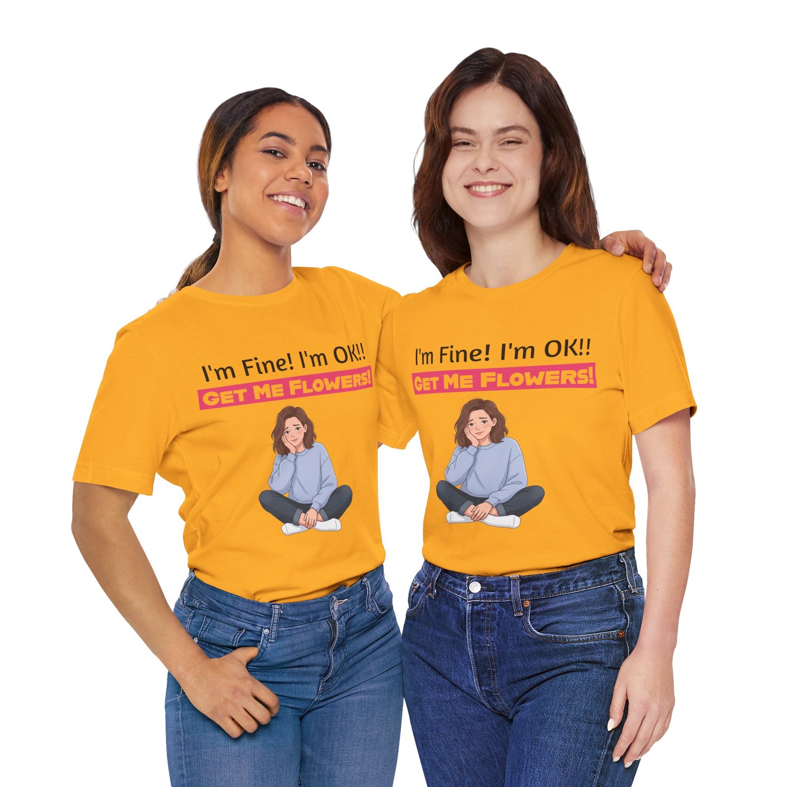 Two women smiling and wearing mustard yellow 'I'm Fine! I'm OK!! GET ME FLOWERS!' funny graphic t-shirts.