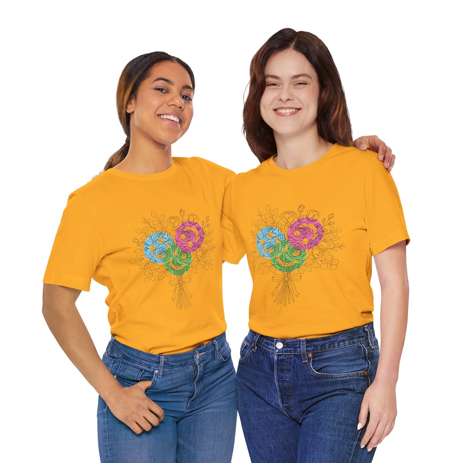 Two women smiling and wearing yellow Floral Yarn Bouquet Colorful Knitting Flowers T-Shirts with teal, magenta, and lime blooms.