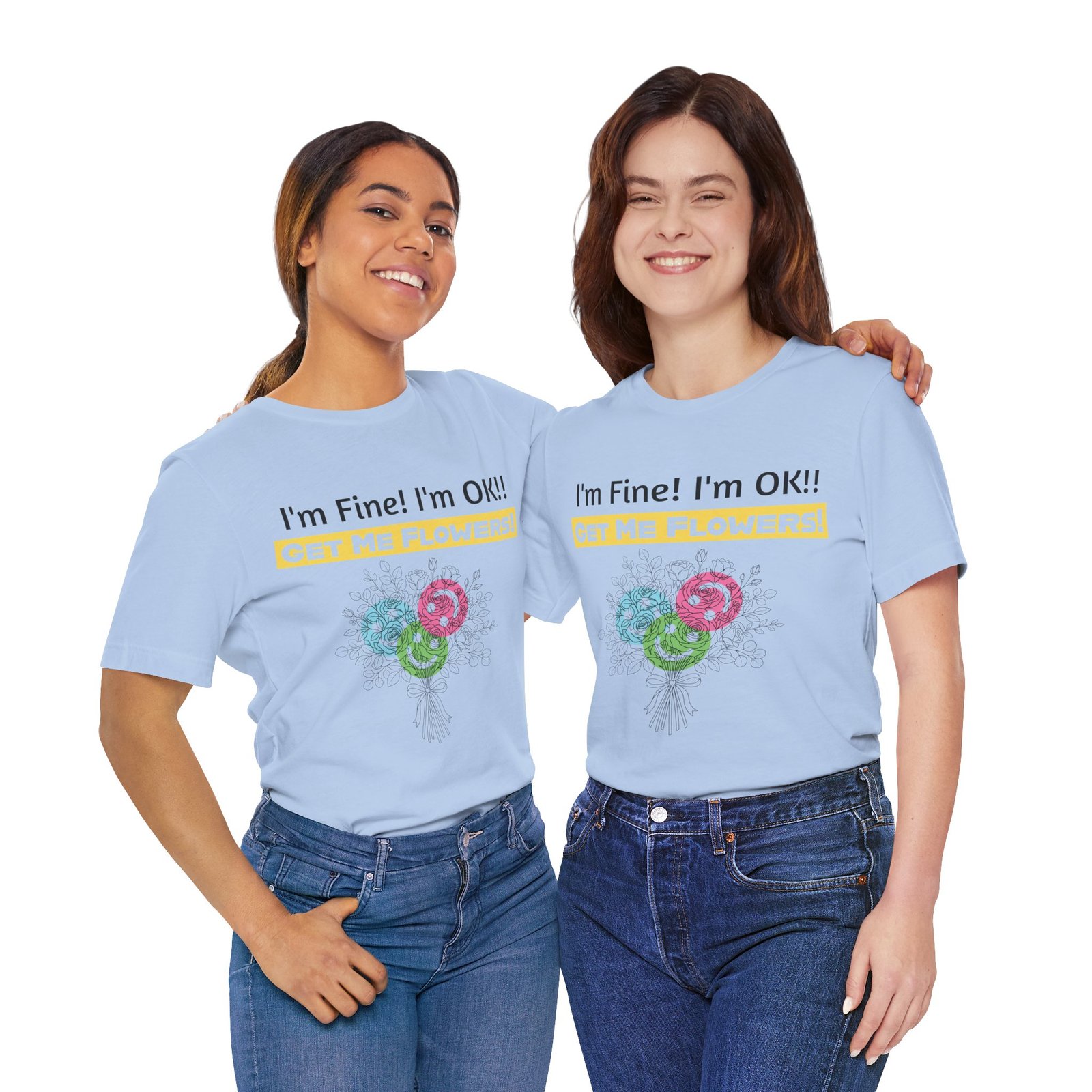 Two women smiling while wearing light blue t-shirts with a colorful flower bouquet graphic and funny text.