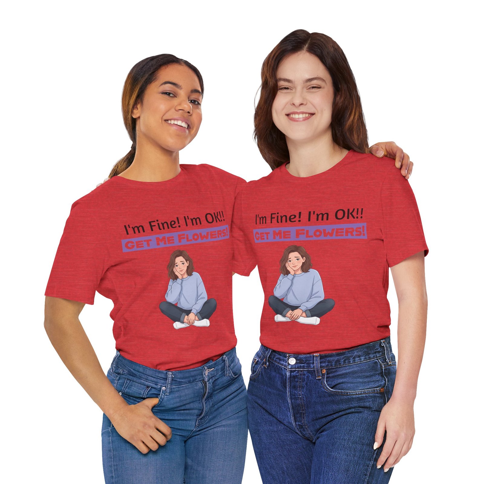 Two women smiling while wearing red t-shirts featuring a funny girl illustration and 'I'm Fine! I'm OK!! GET ME FLOWERS!' text.
