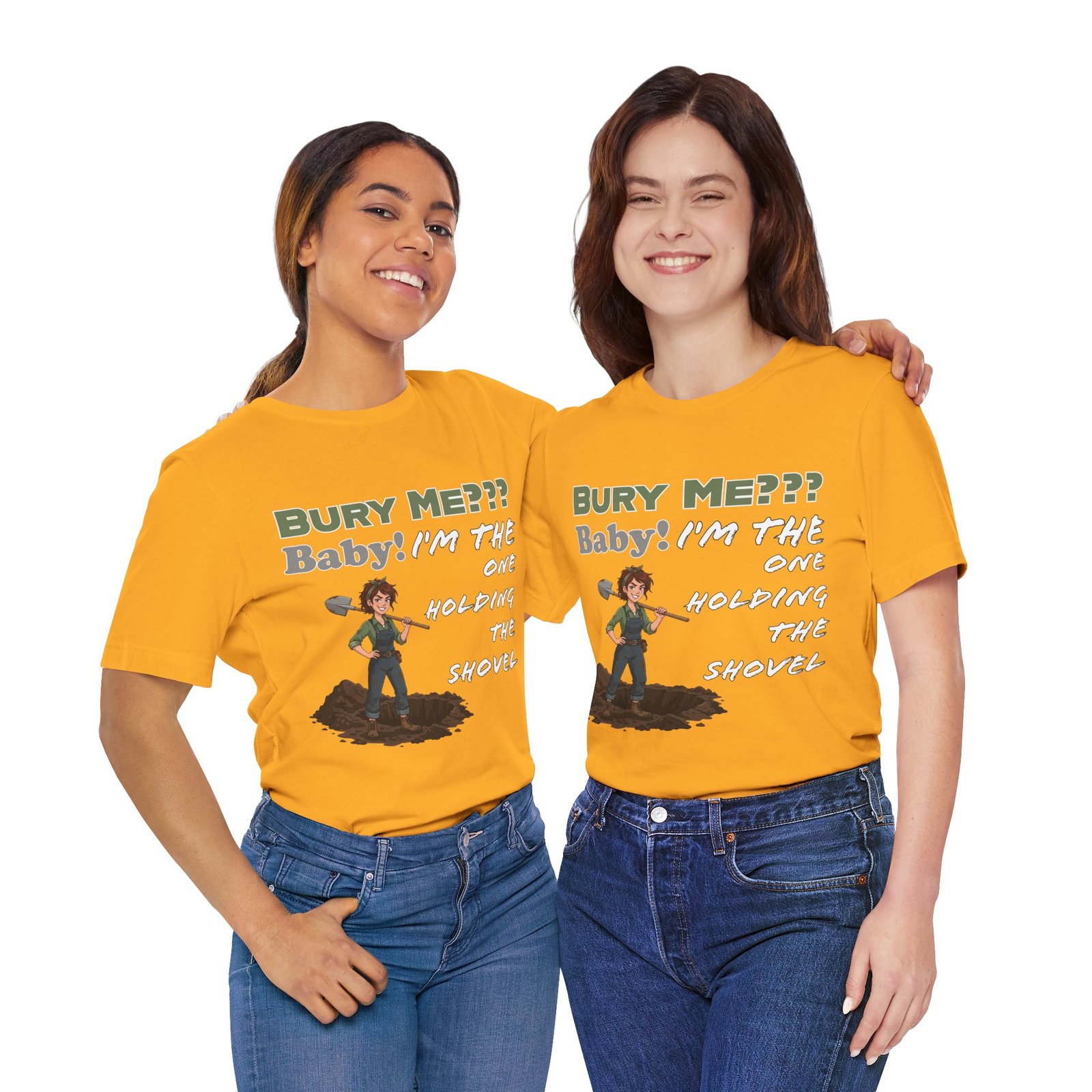Two women smiling while wearing yellow t-shirts featuring a dark humor shovel illustration and cheeky text.