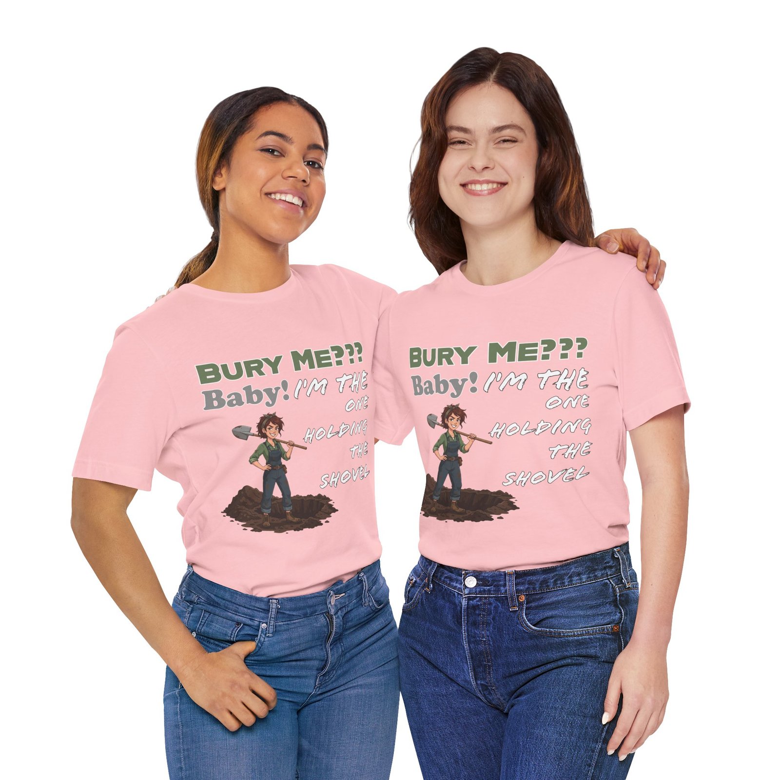Two women wearing pink T-shirts featuring a cartoon character with a shovel and the text 'Bury Me??? Baby! I'm the one holding the shovel'.