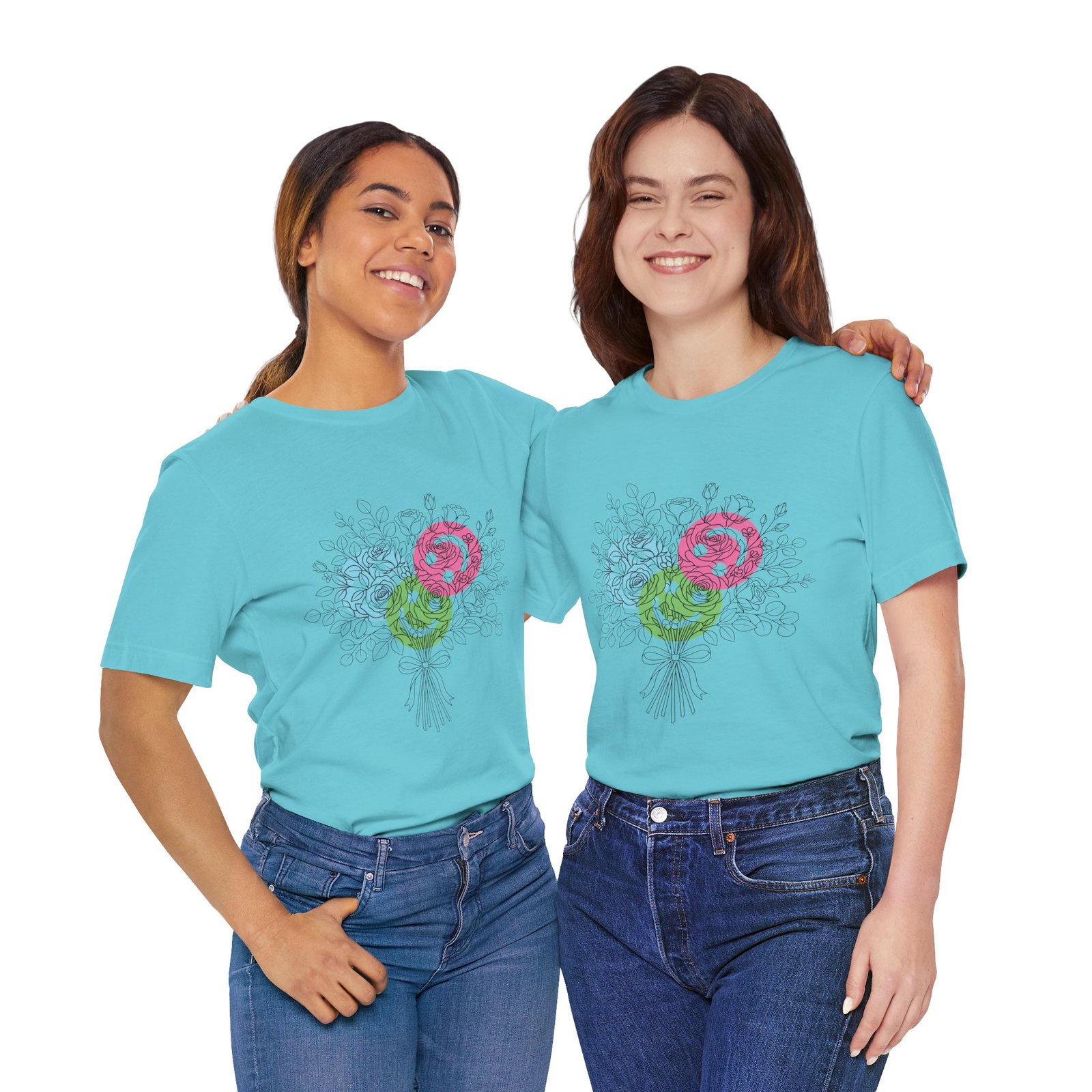 Two women wearing teal t-shirts with a colorful floral yarn bouquet graphic design.