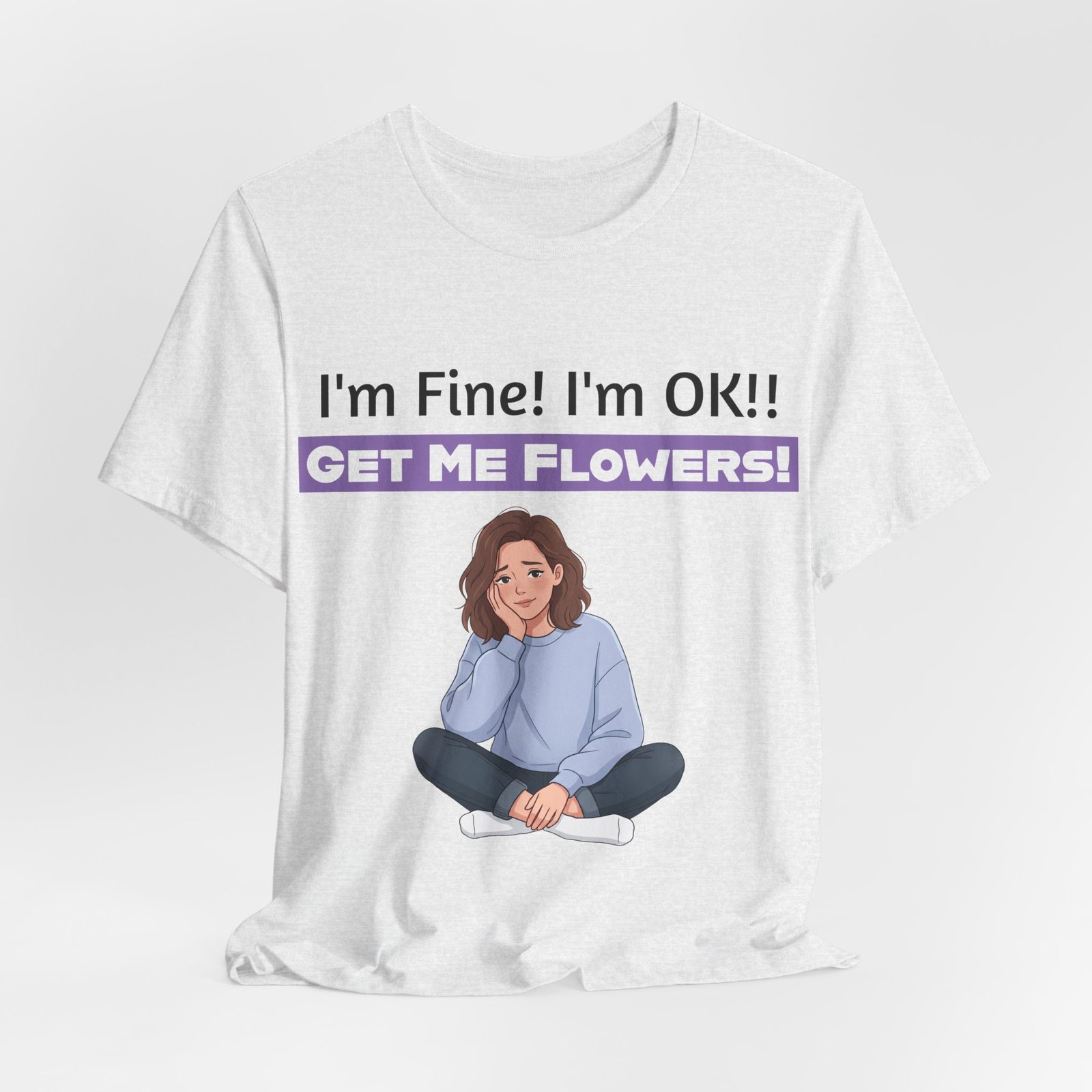 White t-shirt featuring a girl illustration and text "I'm Fine! I'm OK!! GET ME FLOWERS!"