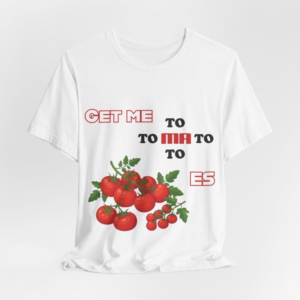 White t-shirt featuring a vintage-style illustration of red tomatoes and the cheeky fragmented text 'GET ME TO MA TO TOES'