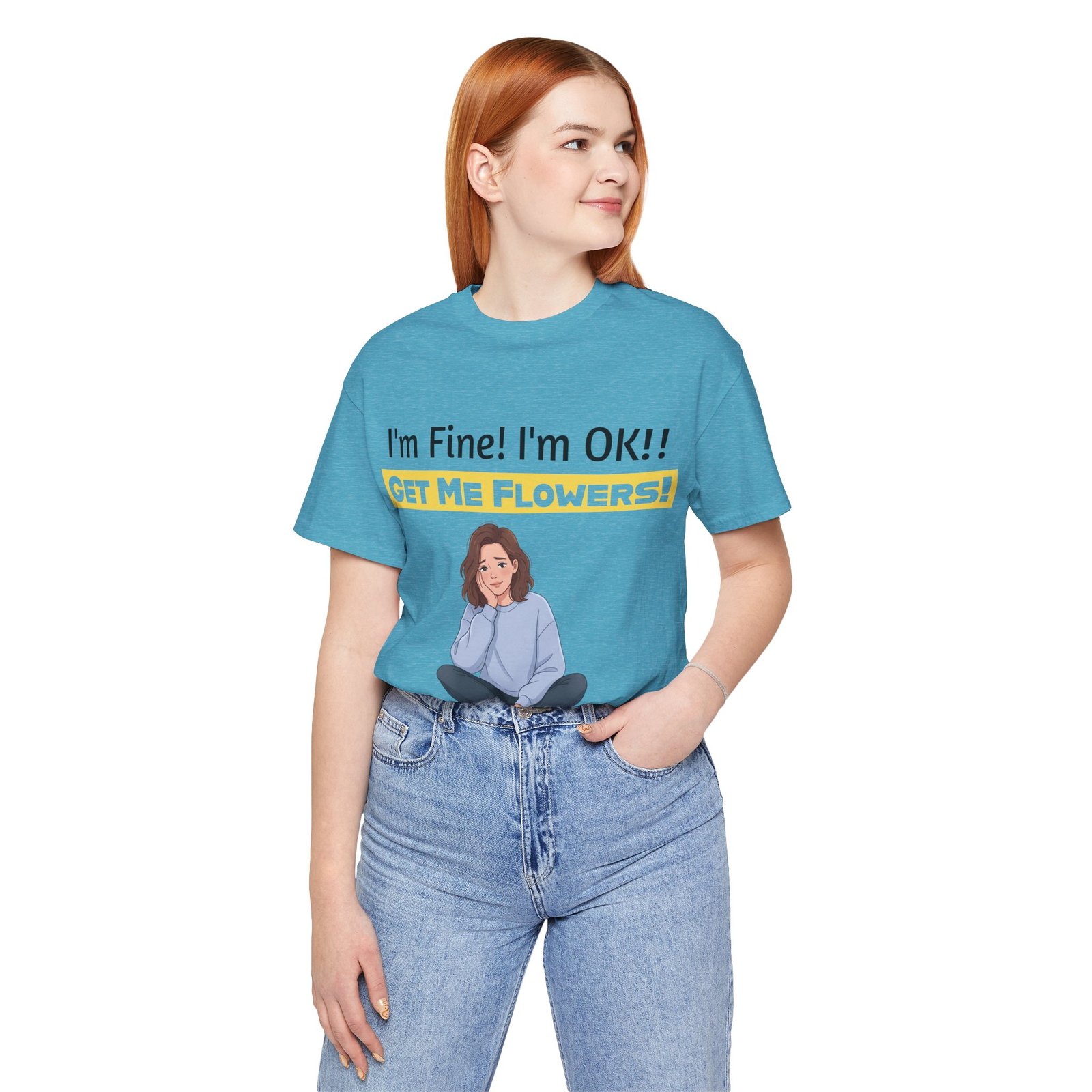 Woman wearing a blue funny t-shirt that says I'm Fine! I'm OK!! Get Me Flowers! with a cartoon illustration.