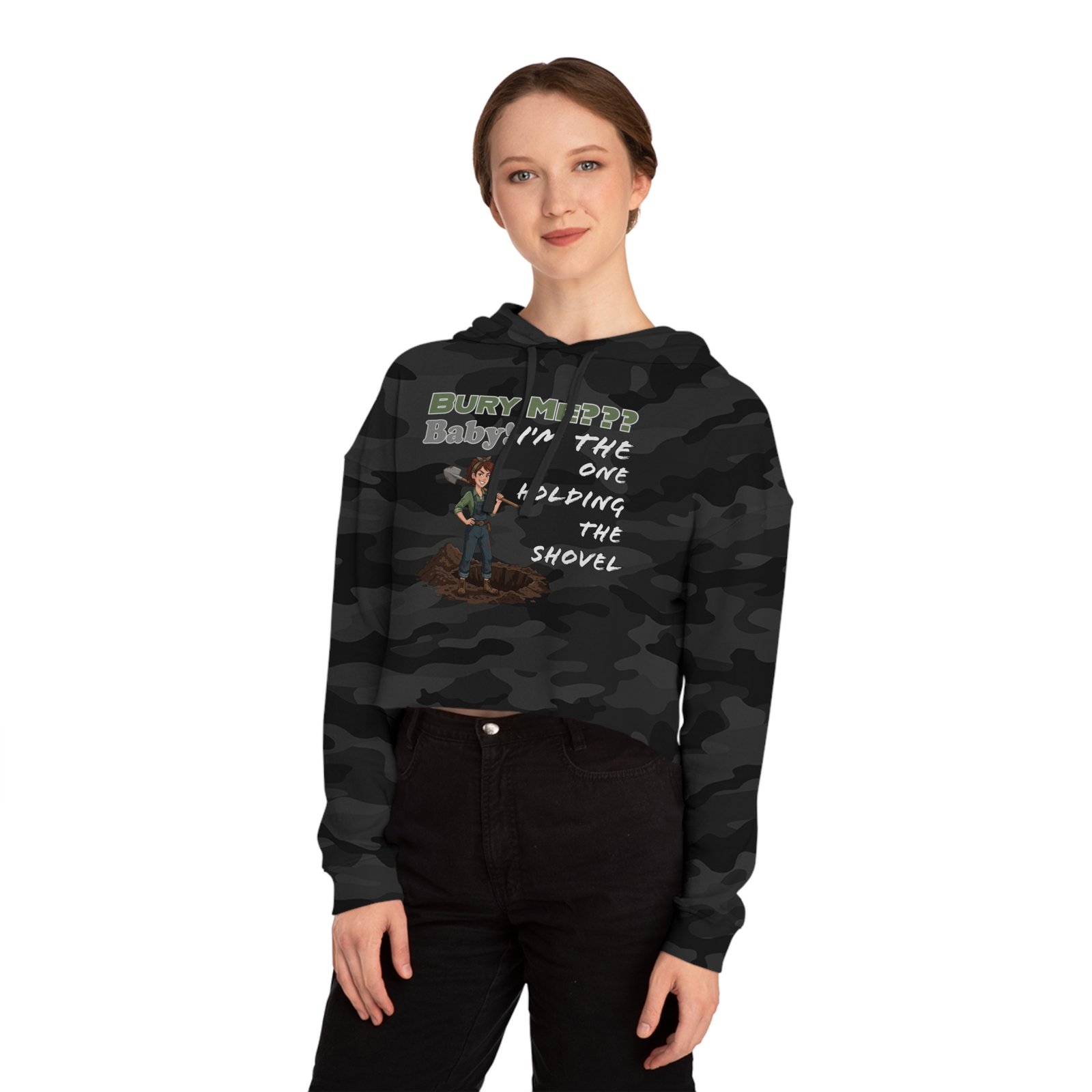 Woman wearing a camouflage cropped hoodie with a cartoon graphic and text: Bury Me??? Baby: I'm The One Holding The Shovel