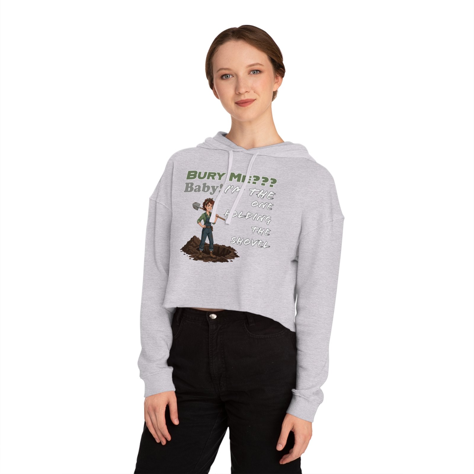 Woman wearing a grey cropped hoodie with a graphic of a character holding a shovel and 'Bury Me??? Baby' text.