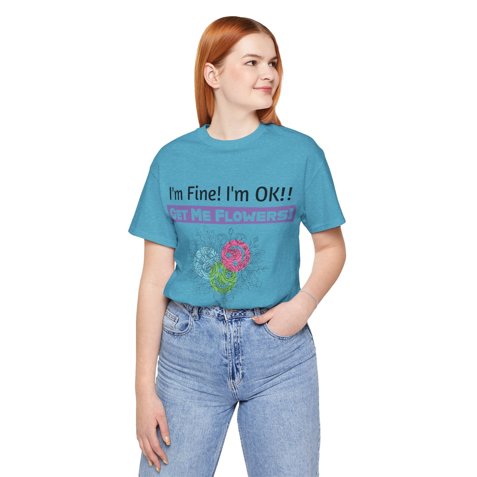 Woman wearing a light blue graphic t-shirt with funny sarcastic text and colorful floral prints.