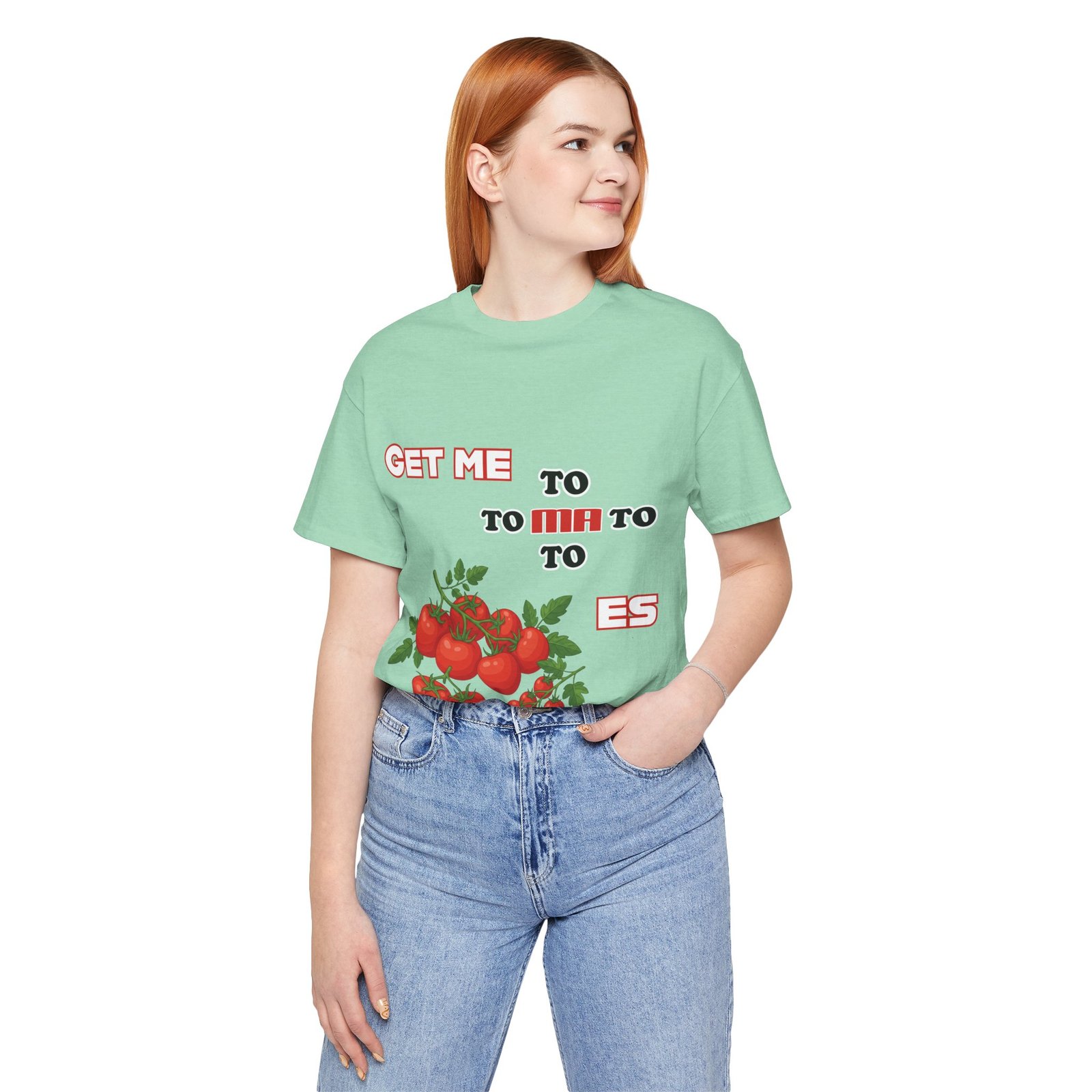 Woman wearing a mint green t-shirt featuring vintage tomato illustrations and the phrase Get Me To Ma To Toes.