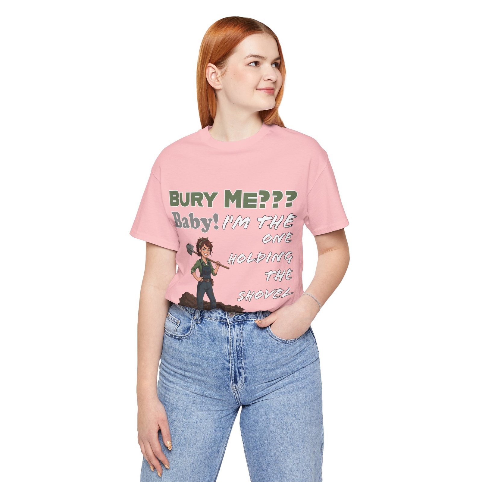 Woman wearing a pink "Bury Me??? Baby! I'm the One Holding the Shovel" t-shirt featuring a dark humor character graphic.