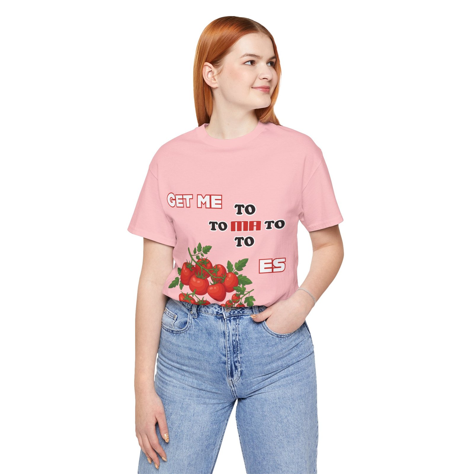 Woman wearing a pink 'Get Me To Ma To Toes' T-shirt featuring vintage tomato illustrations and retro typography.