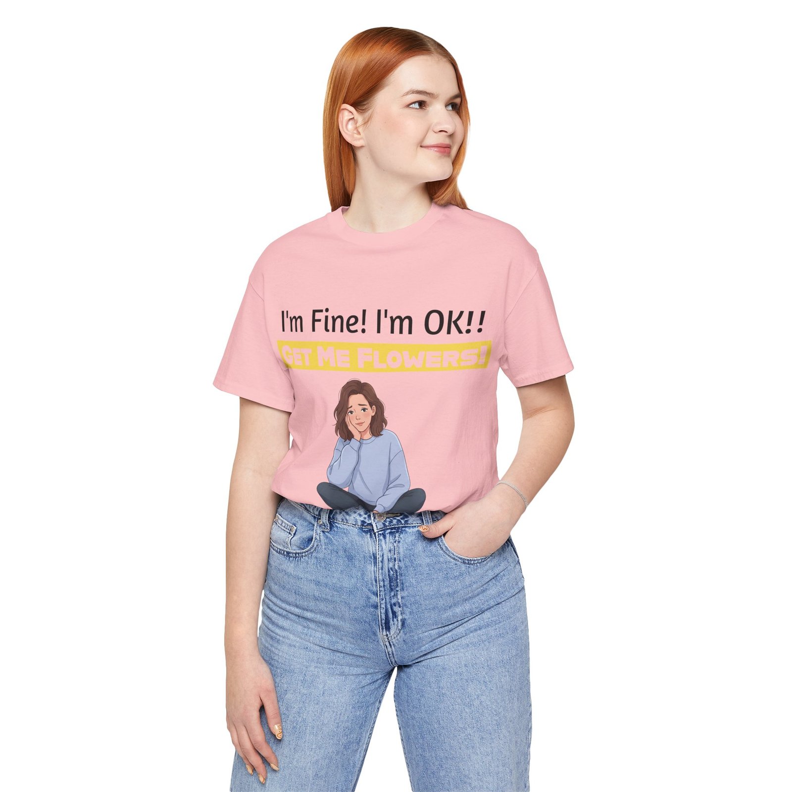 Woman wearing a pink I'm Fine! I'm OK!! Get Me Flowers! funny t-shirt with a cartoon character illustration.