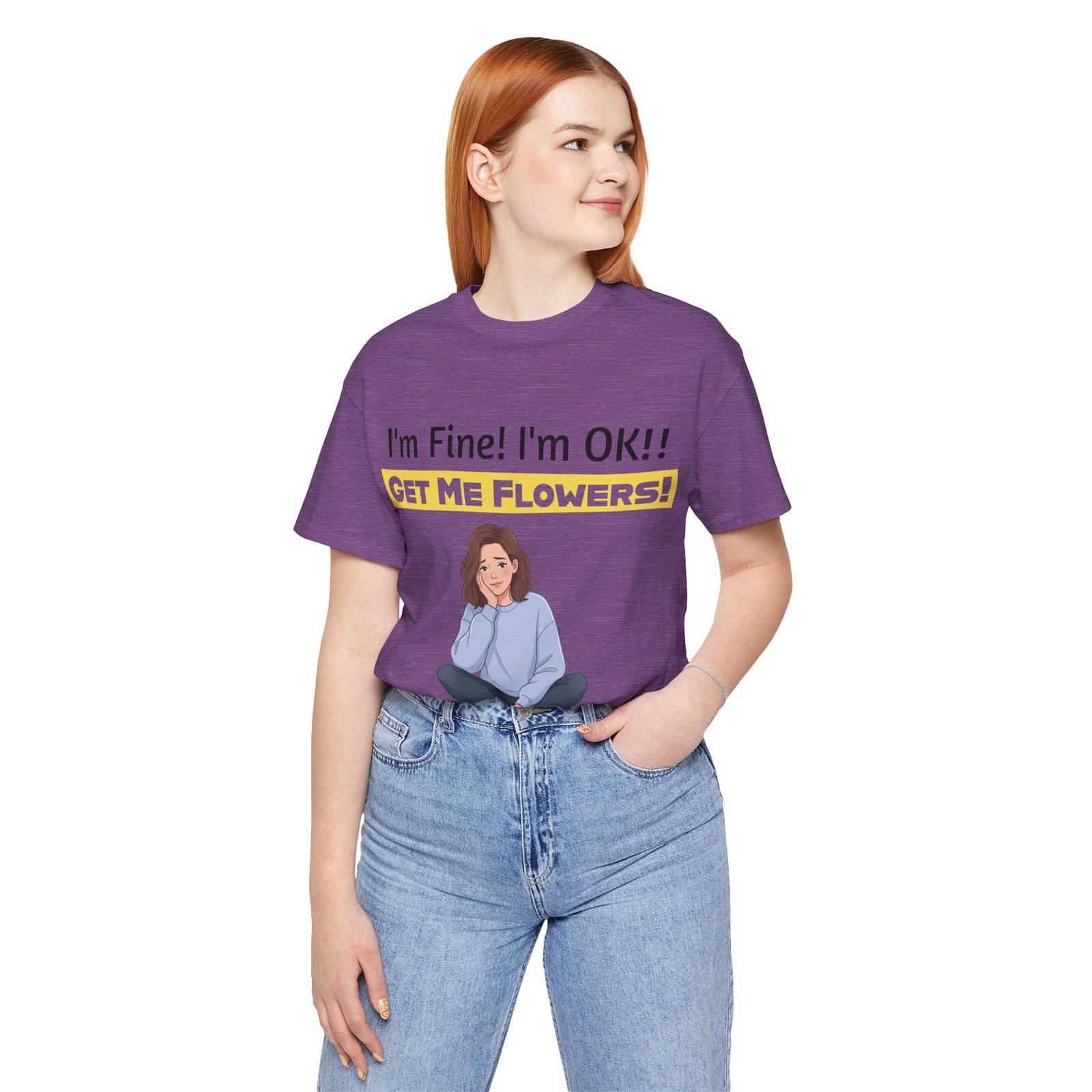 Woman wearing a purple funny t-shirt with the text I'm Fine! I'm OK!! GET ME FLOWERS! and an illustration of a girl.