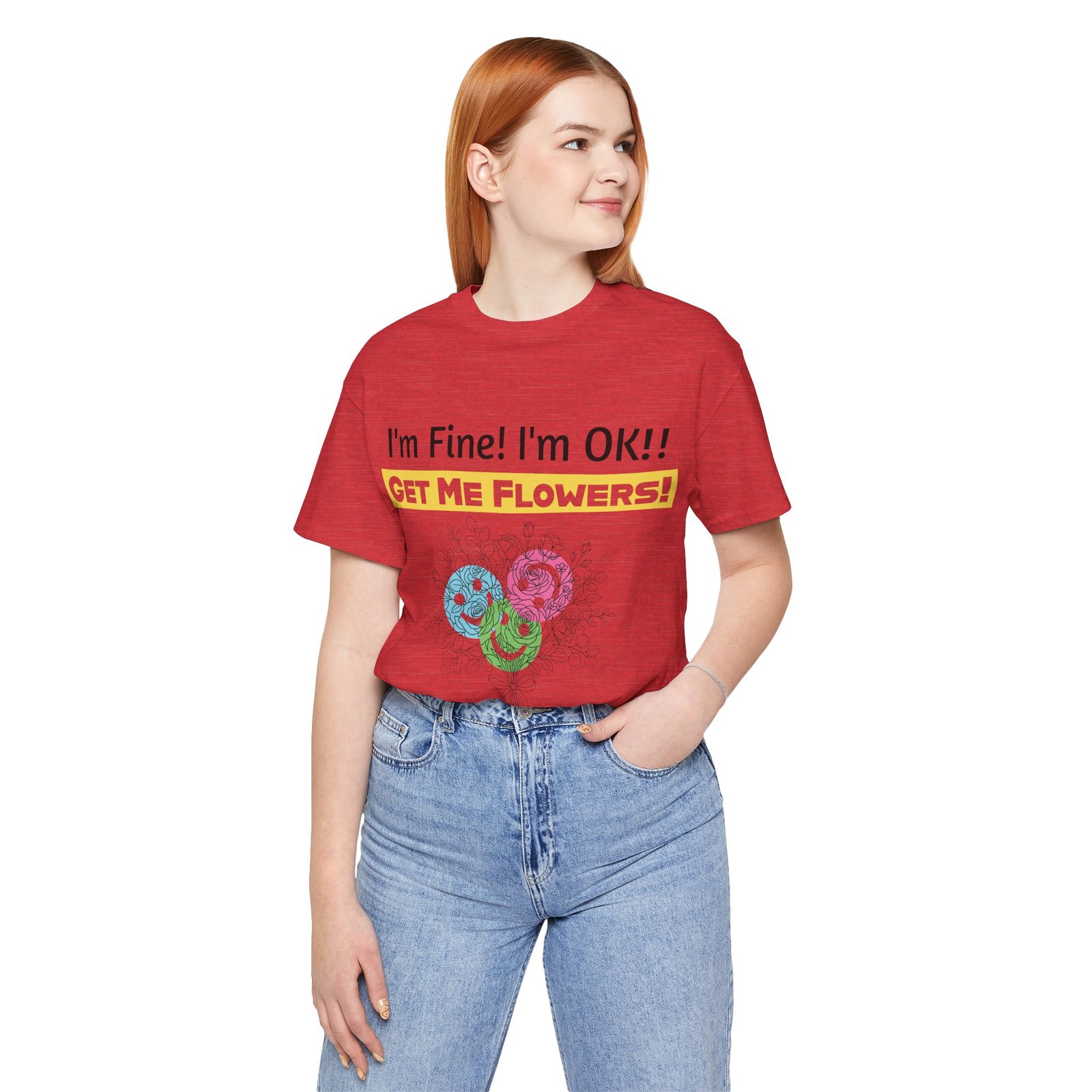 Woman wearing a red funny T-shirt with the text I'm Fine! I'm OK!! GET ME FLOWERS! and abstract colorful flower graphic.