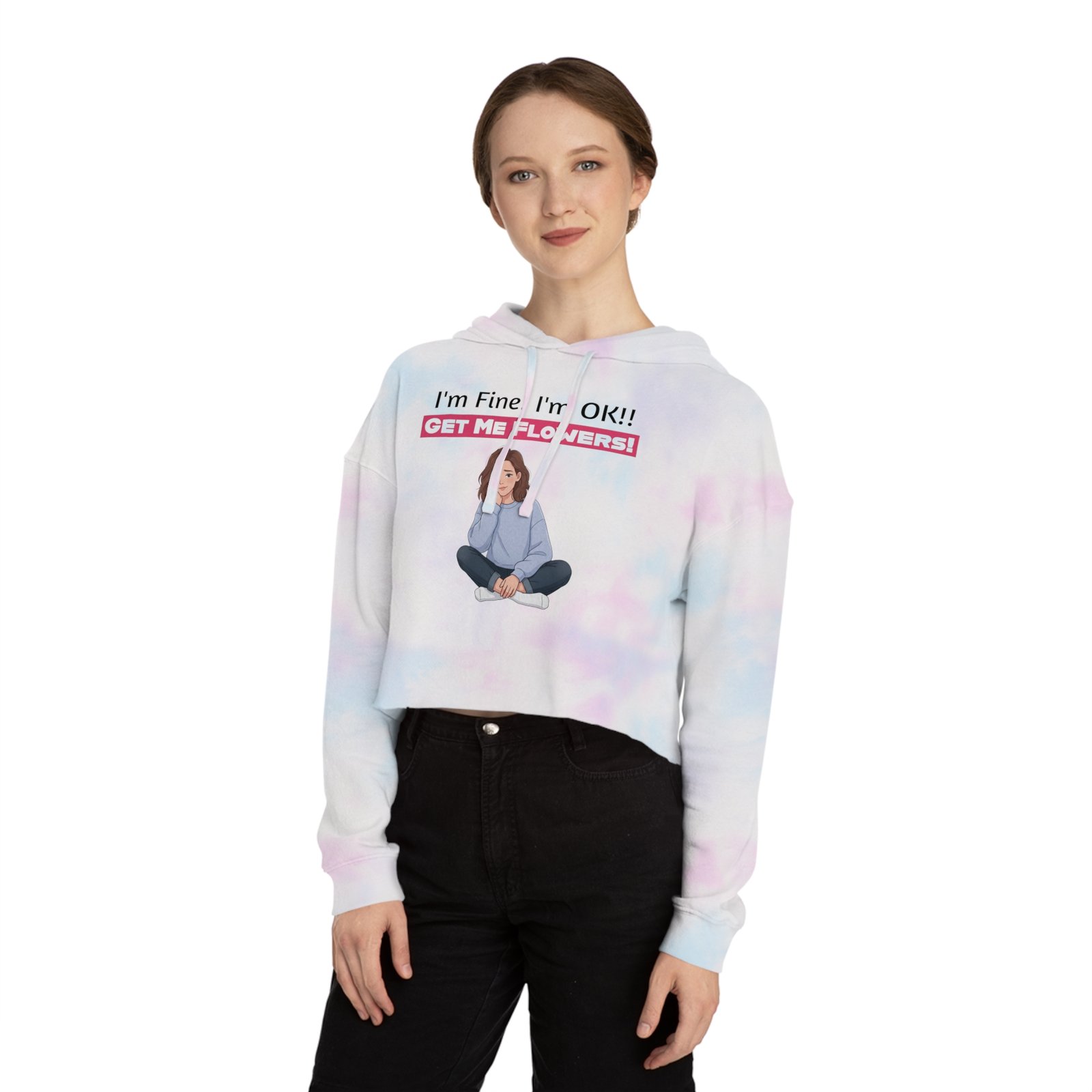 Woman wearing a white and pink tie-dye cropped hoodie with a funny graphic text and seated girl image.