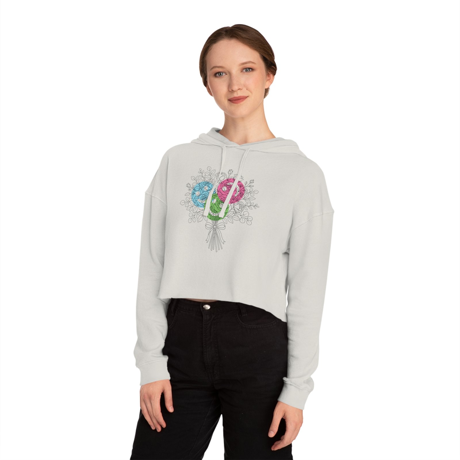 Woman wearing a white cropped hoodie featuring a colorful floral lollipop bouquet graphic.