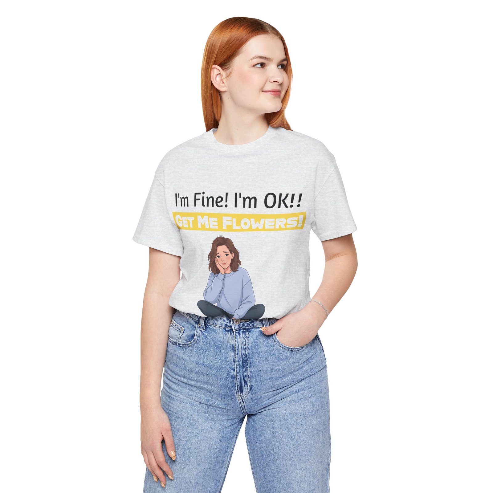 Woman wearing a white funny T-shirt with 'I'm Fine! I'm OK!! GET ME FLOWERS!' text and a cute illustration.