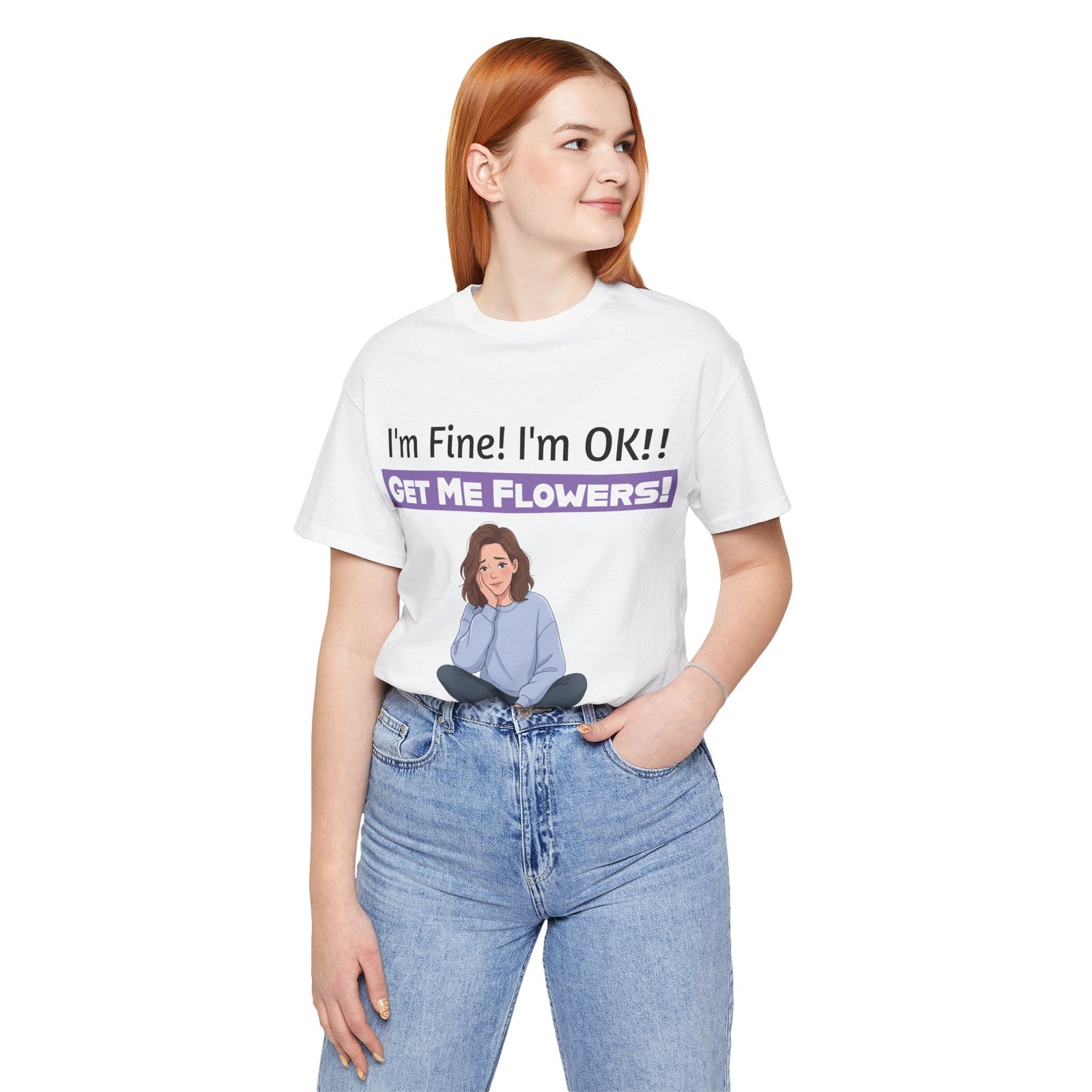 Woman wearing a white T-shirt featuring an illustration of a girl and the text 'I'm Fine! I'm OK!! GET ME FLOWERS!'