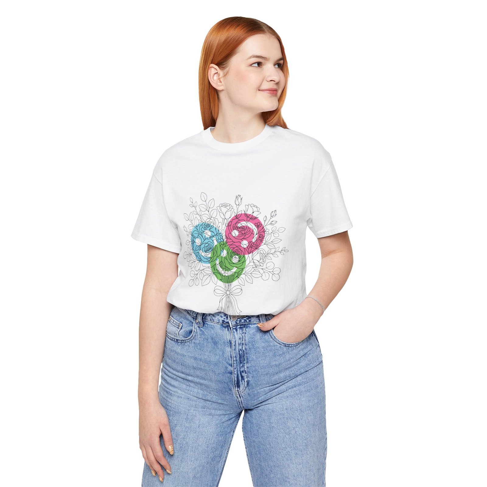 Woman wearing a white t-shirt with a colorful floral yarn bouquet design in teal, magenta, and lime.