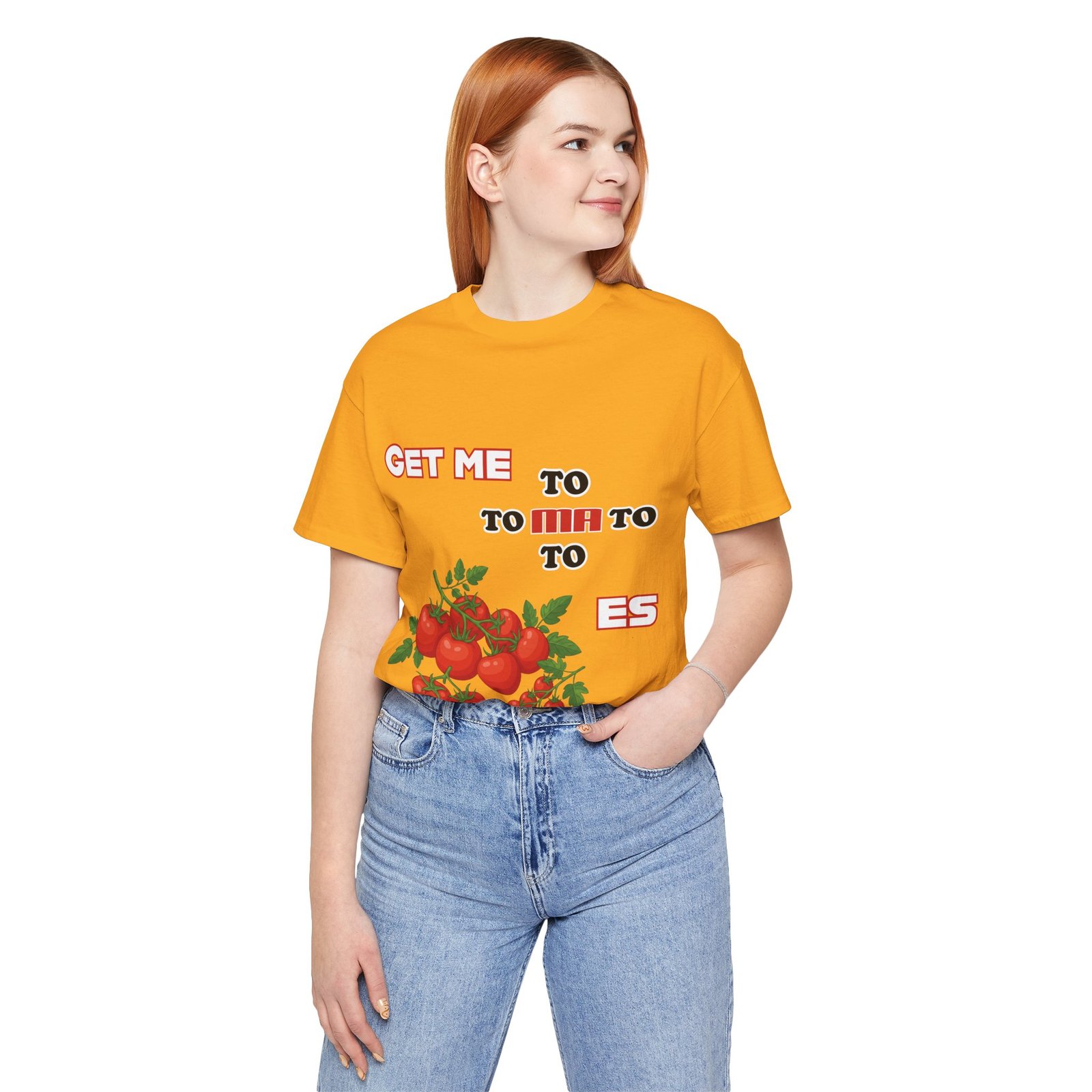 Woman wearing an orange T-shirt with vintage tomato illustrations and the phrase "Get Me To Ma To Toes"
