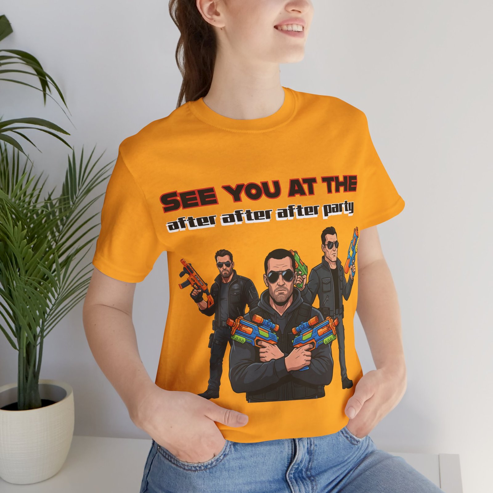Yellow T-shirt featuring a trio of sunglasses-clad characters with colorful water guns and "SEE YOU AT THE after after after party" text.