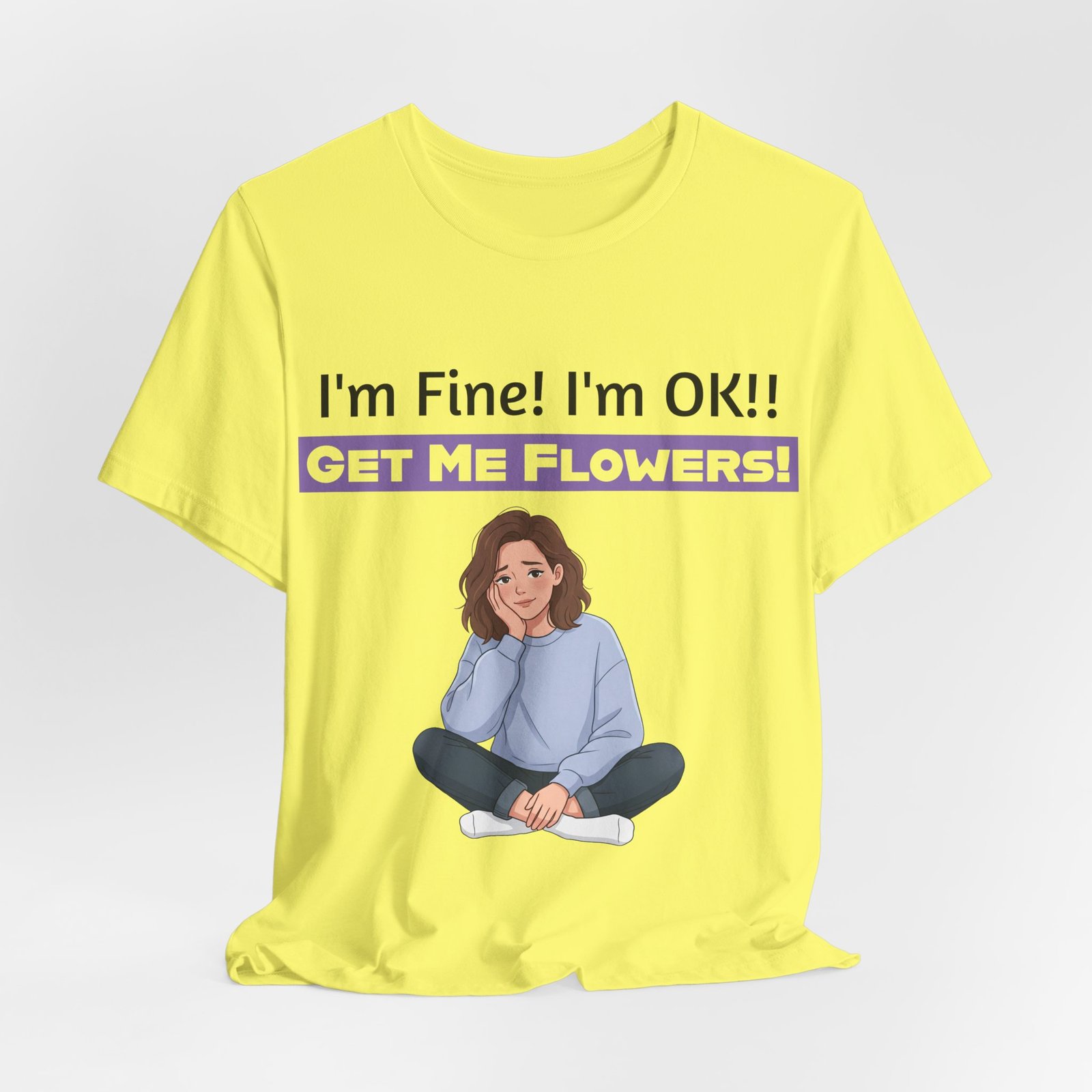Yellow T-shirt with cartoon girl illustration and text "I'm Fine! I'm OK!! GET ME FLOWERS!"